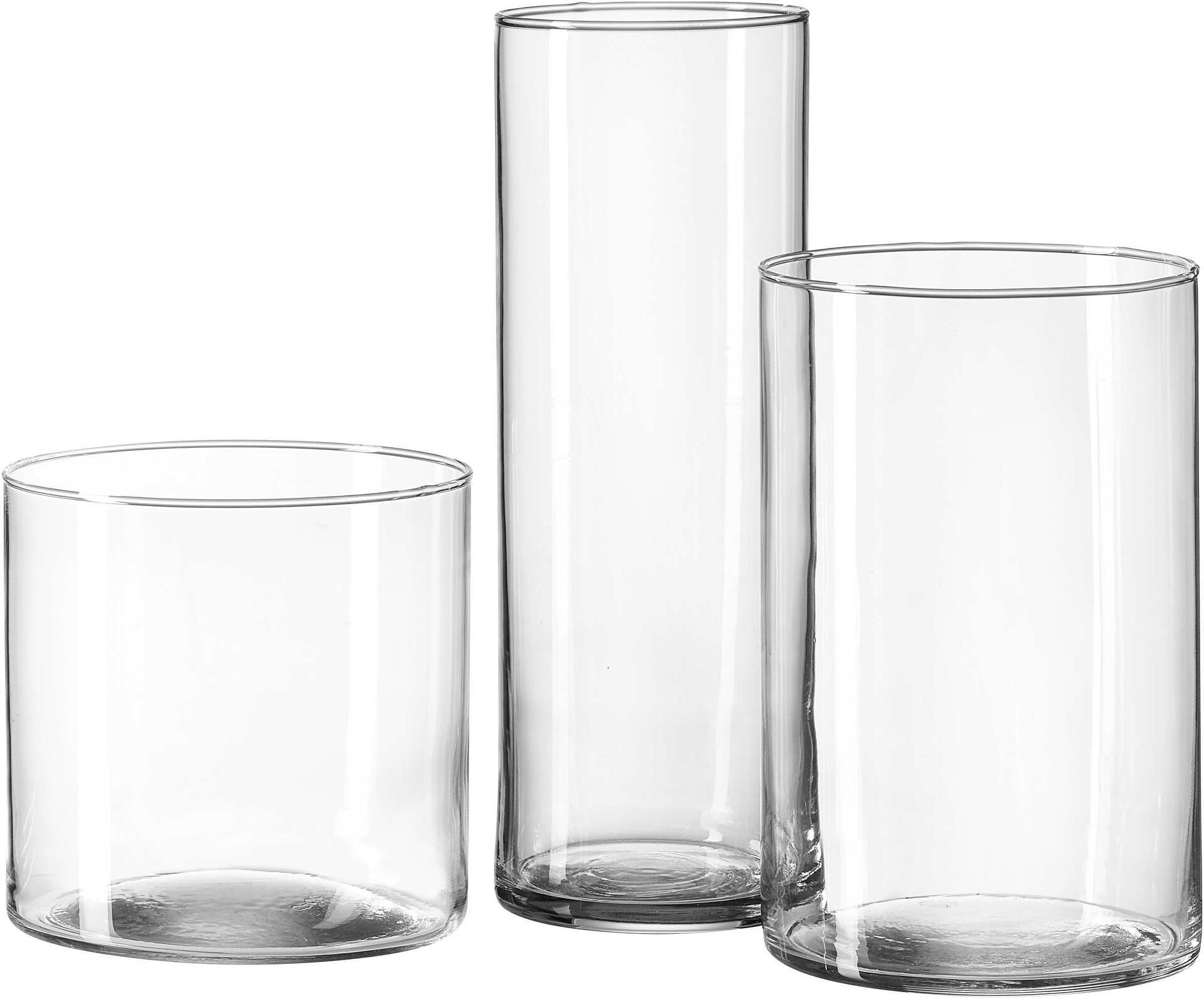 Drei transparente Glasvasen in verschiedenen zylindrischen Formen und Höhen