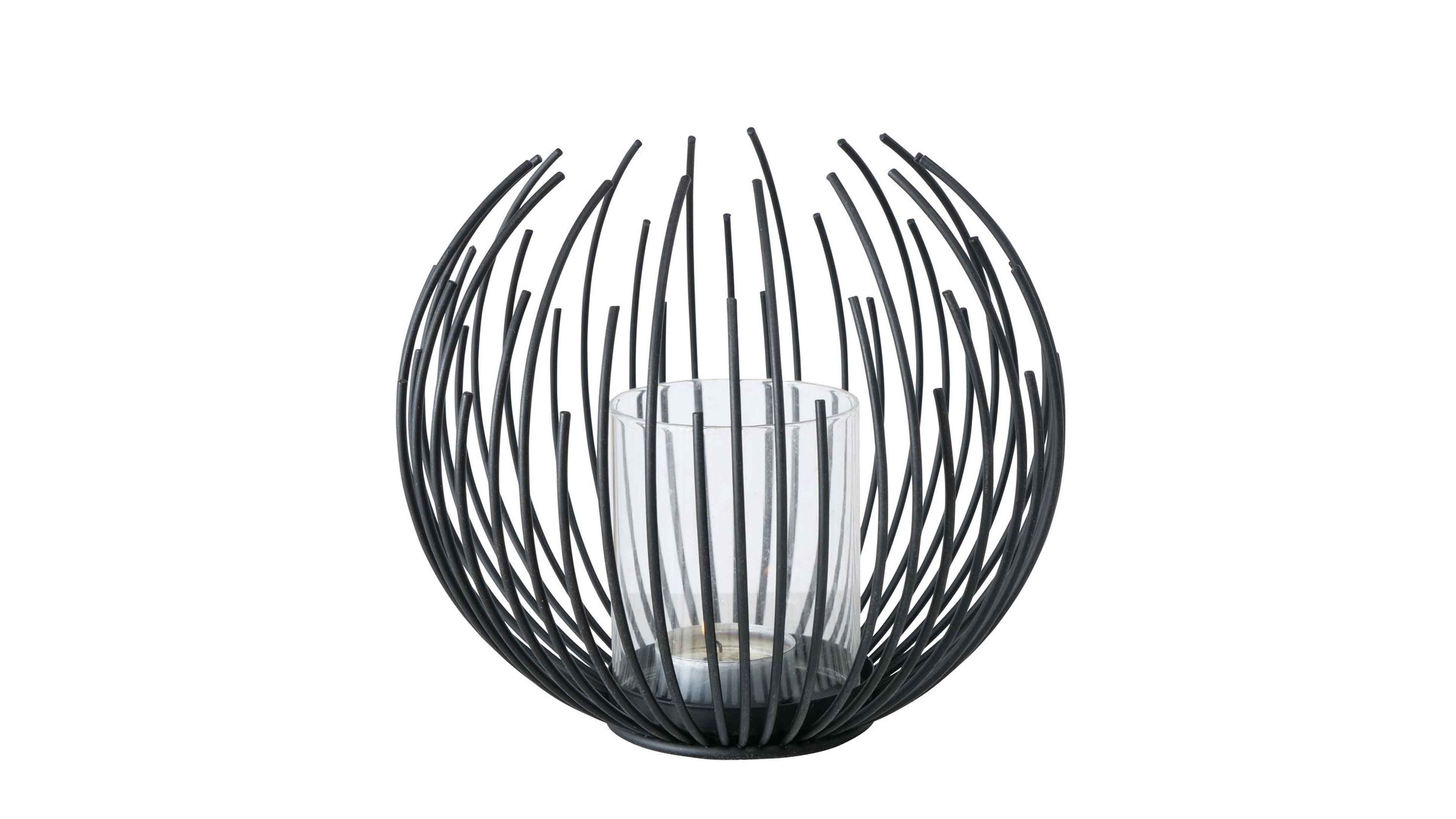 Rundes Windlicht mit schwarzen gebogenen Metallstäben und klarem Glaszylinder in der Mitte