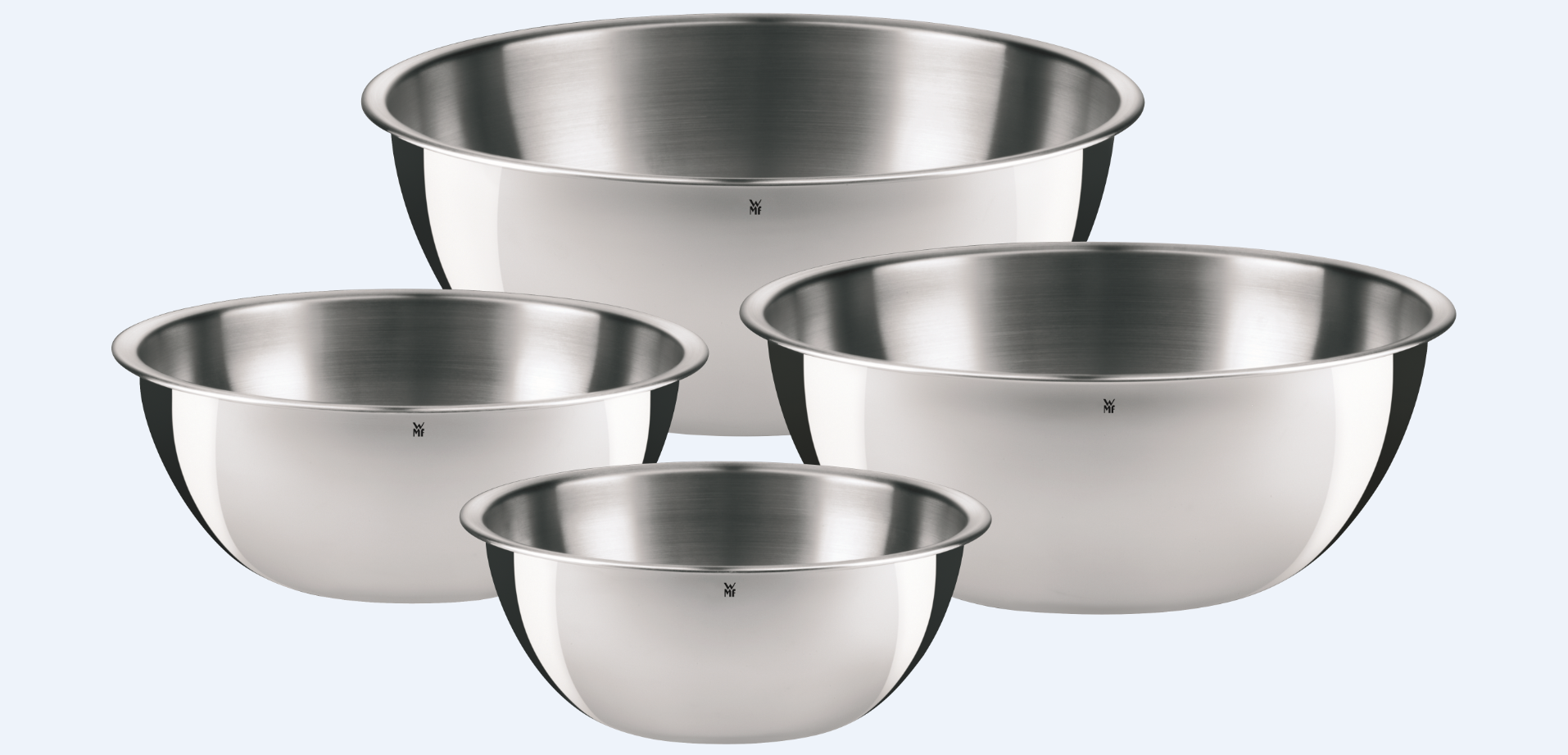 Vier runde Küchenschüsseln aus Edelstahl in unterschiedlichen Größen mit glattem Rand
