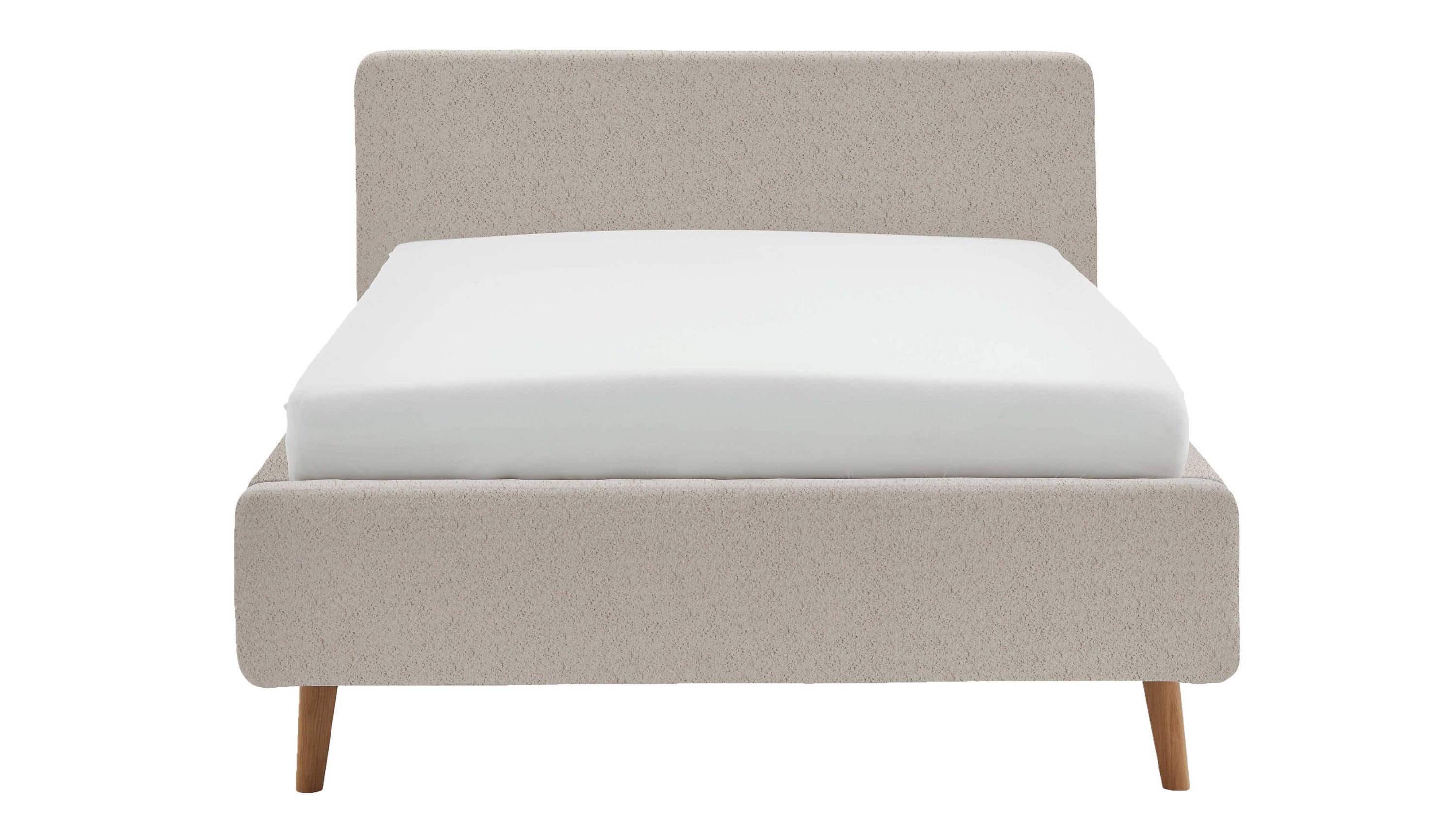 Polsterbett mit Holzfüßen und Kopfteil in Beige Beigefarbenes Polsterbett mit rechteckigem Kopfteil und Holzfüßen weiße Matratze