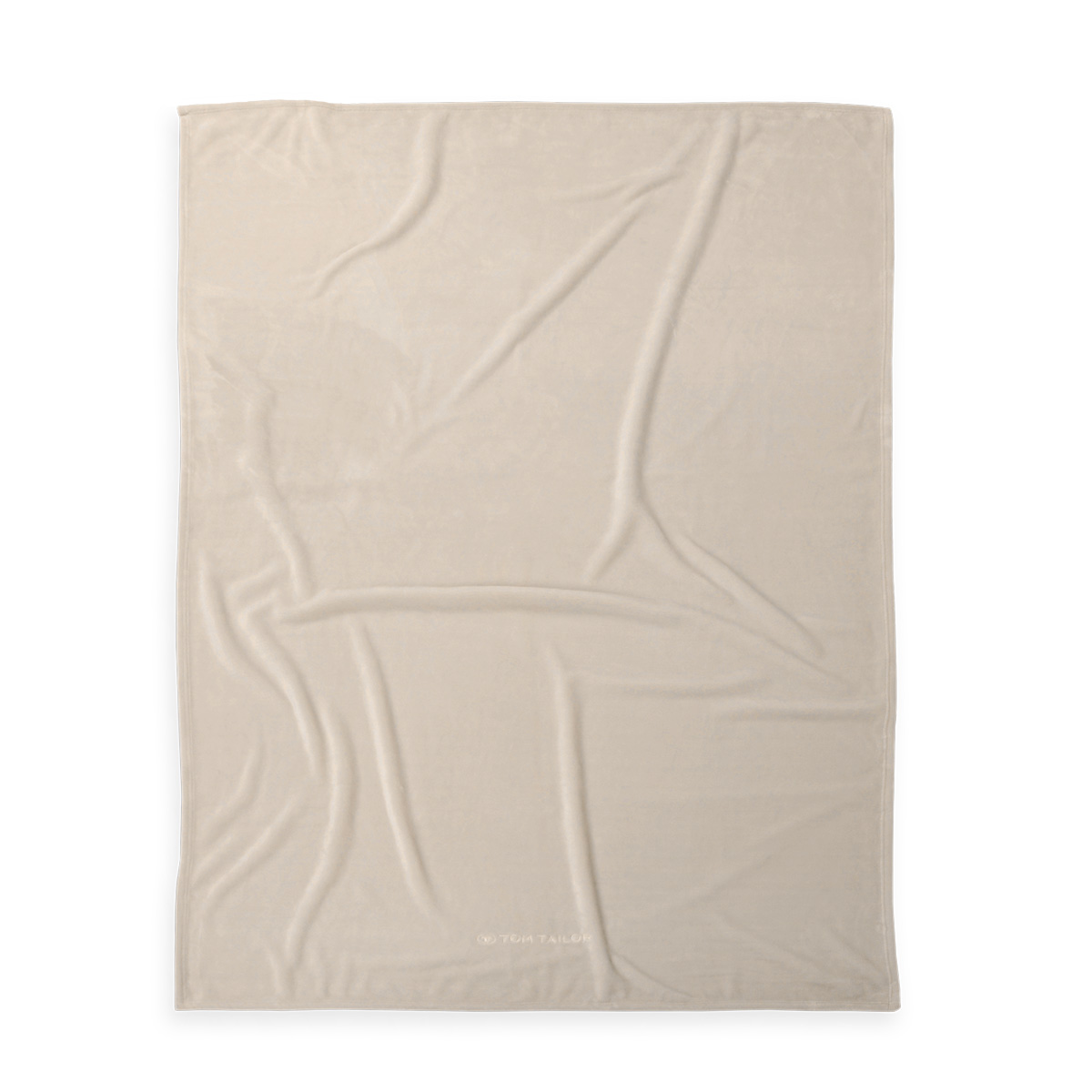 Draufsicht auf beige Wellsoft-Kuscheldecke mit flauschiger Oberfläche und sichtbaren Falten