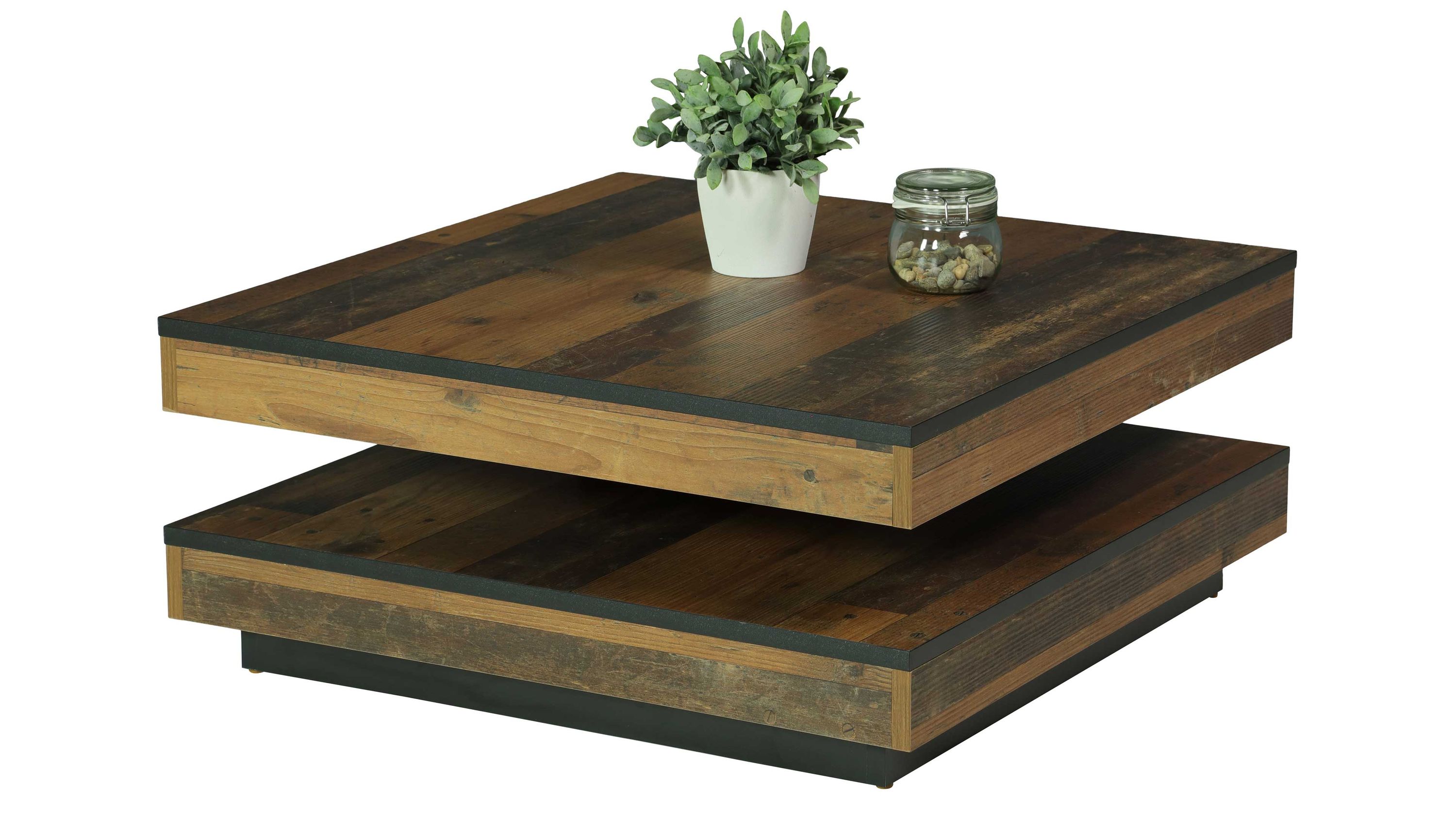 Quadratischer Couchtisch mit zwei Ebenen in dunklem Holz mit Pflanze und Glas auf der oberen Fläche