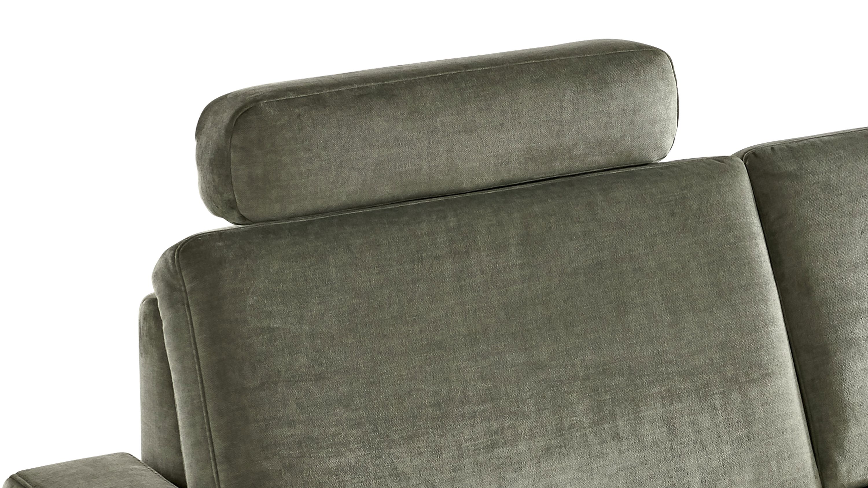 Olivfarbene rechteckige Kopfstütze aus Mikrovelours auf einem Polstersofa