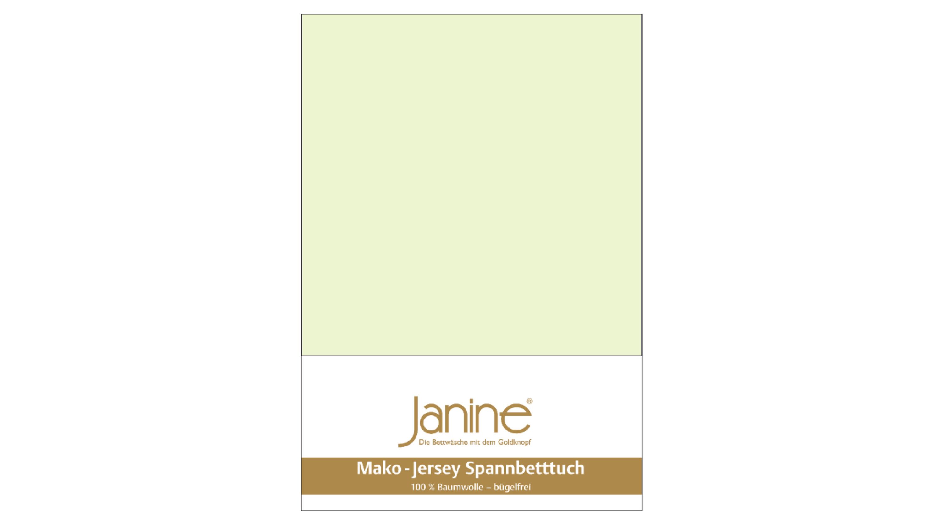 Hellgrünes Spannbettlaken aus Jersey-Stoff mit Verpackung und Markenaufdruck