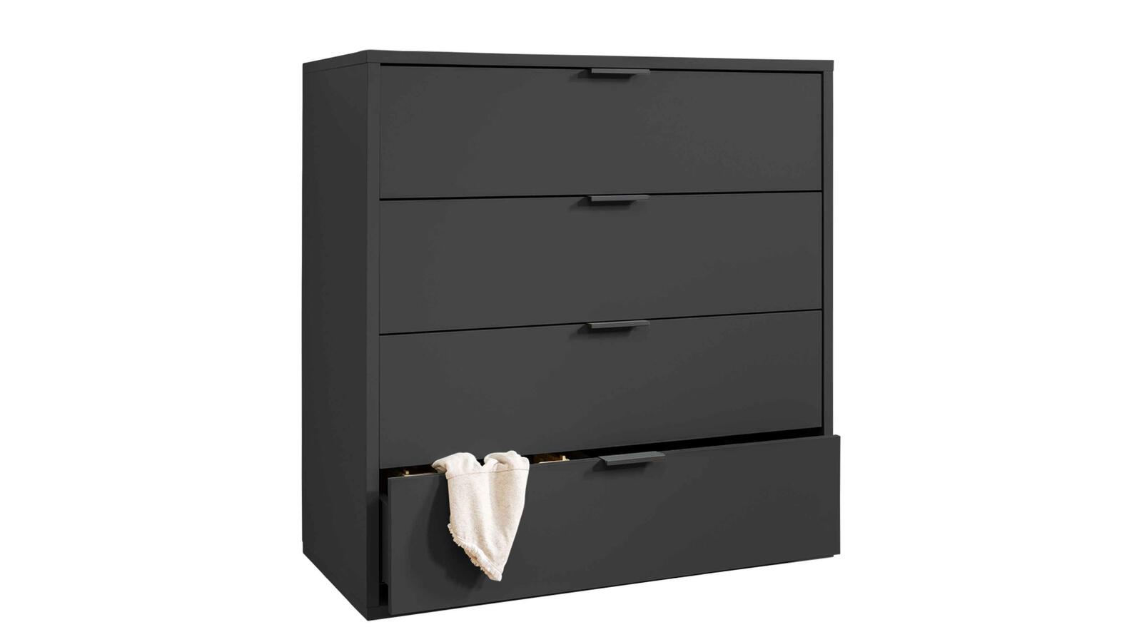 Sideboard in dunklem Grau mit matter Oberfläche  vier Schubladen  untere leicht geöffnet mit weißem Stoff sichtbar