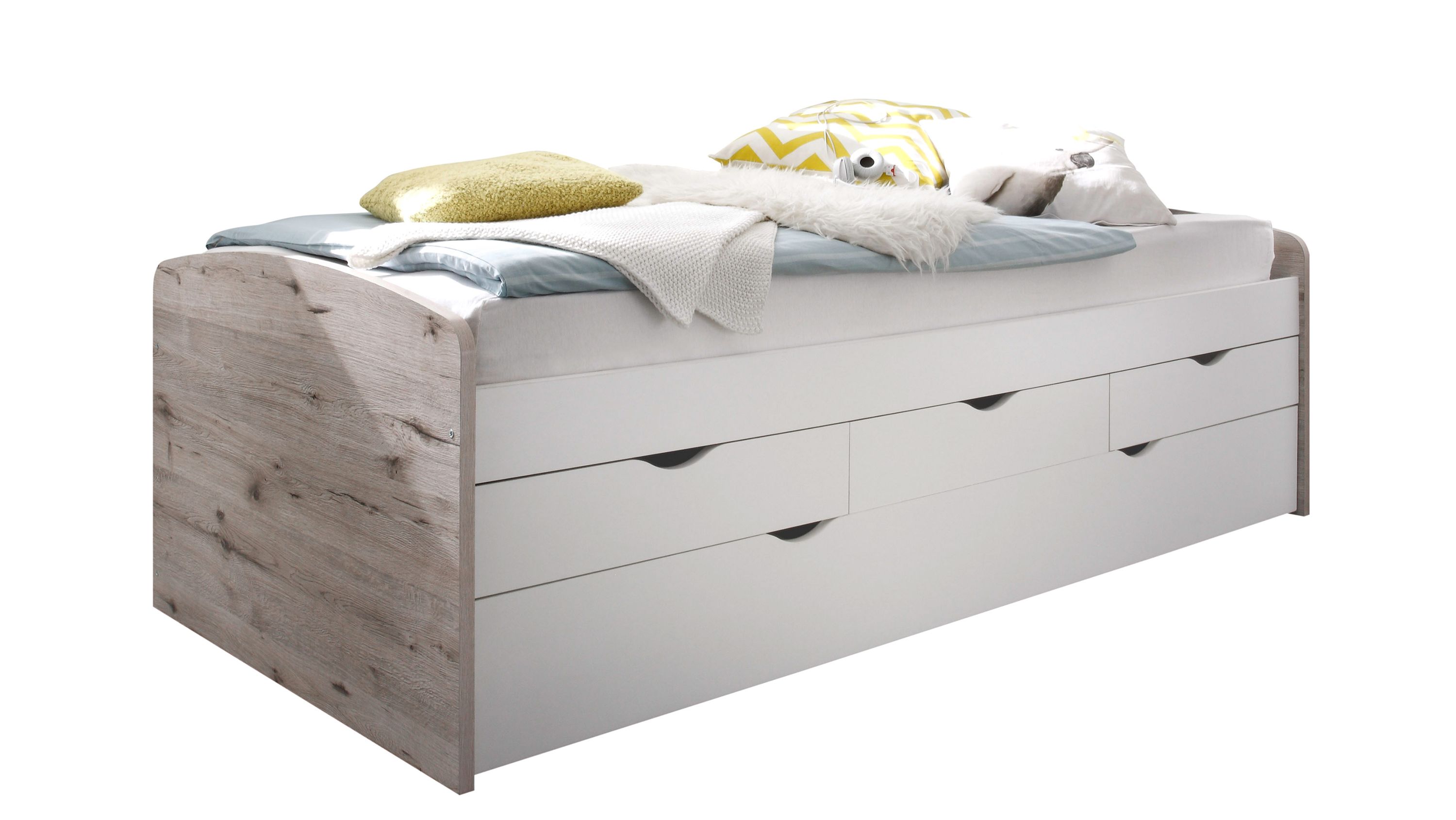 Funktionsbett mit sandeichefarbenen Seiten und weißen Schubladen unter der Liegefläche