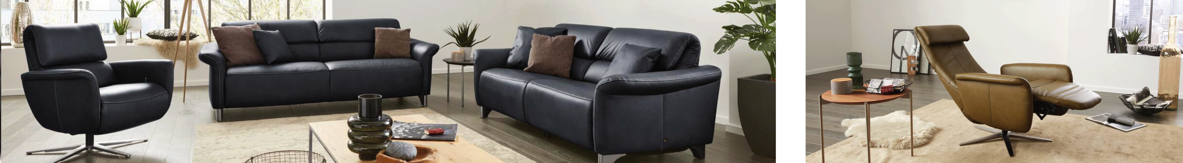 Modernes Wohnzimmer mit schwarzem Ledersofa-Set, passendem Sessel und Beistelltisch in heller Einrichtung.