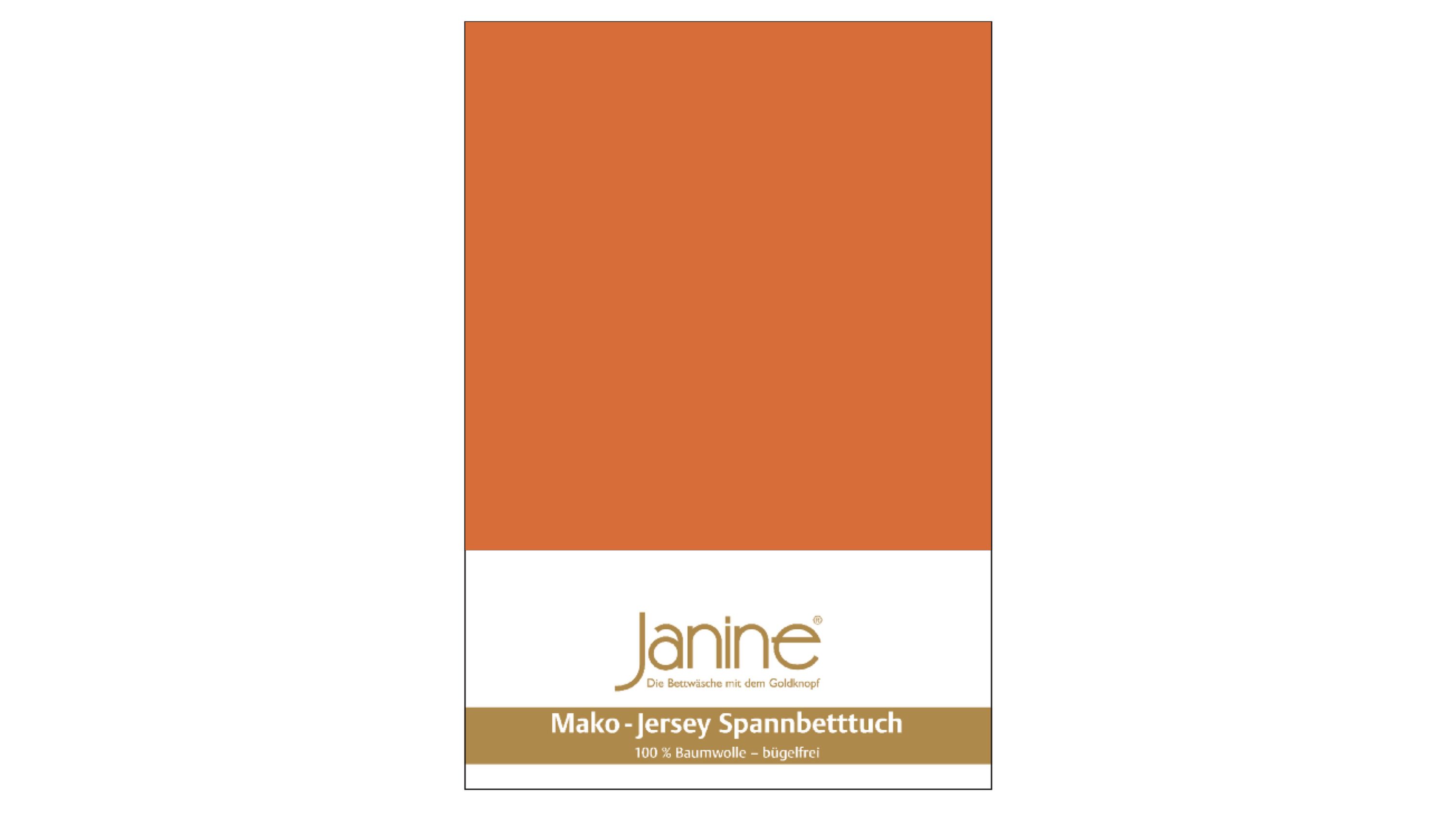 Spannbettlaken in rostorange mit Markenetikett Spannbettlaken in rostorange mit weißem und goldfarbenem Etikett