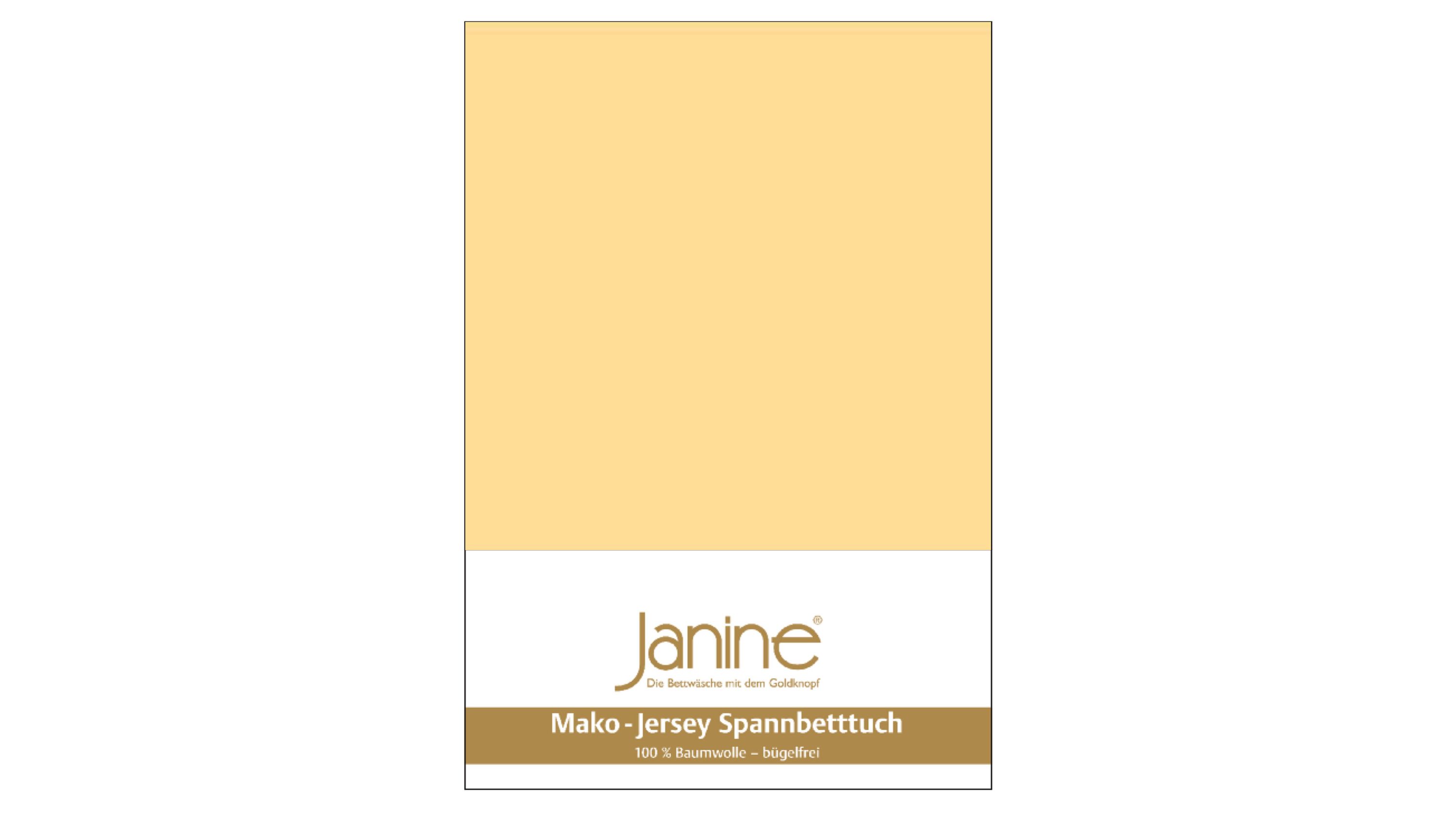 Beiges Spannbettlaken aus Jersey-Stoff mit Verpackung und Markenaufdruck
