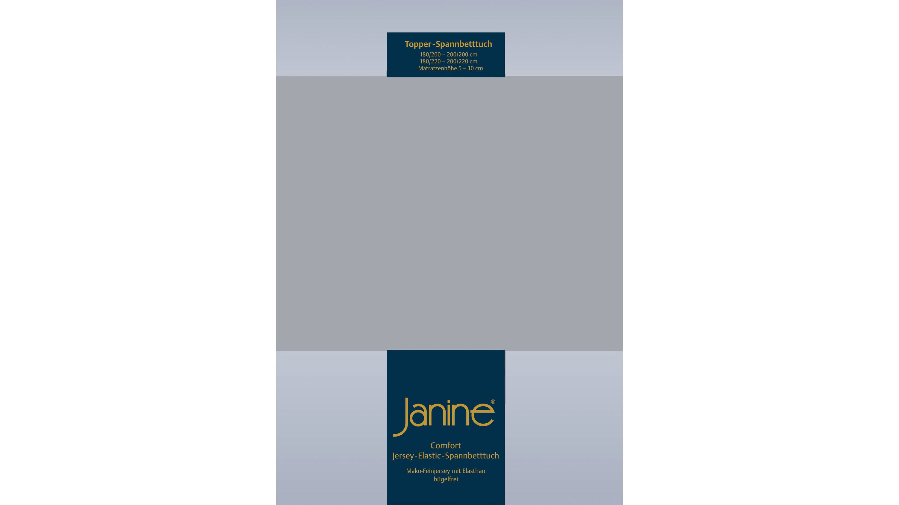 Hellgraues Spannbettlaken mit elastischem Rand und Aufschrift Janine auf Verpackung
