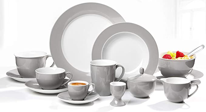 Tischservice 24-teiliges Porzellan-Kombiservice in elegantem Grau 24-teiliges graues Service mit Tellern, Tassen, Schüsseln und Untertassen auf weißem Untergrund