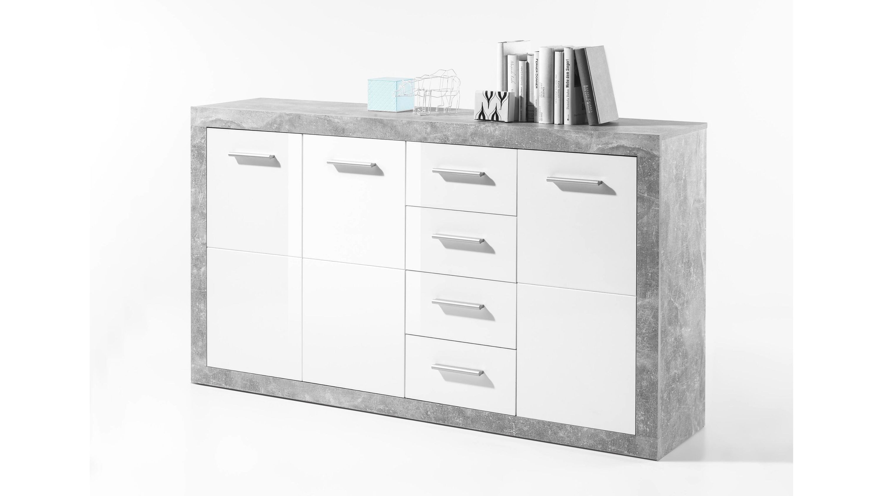 Sideboard mit weißen Türen und betonfarbenem Rahmen Sideboard mit drei weißen Türen und vier weißen Schubladen Rahmen in betonfarbener Optik