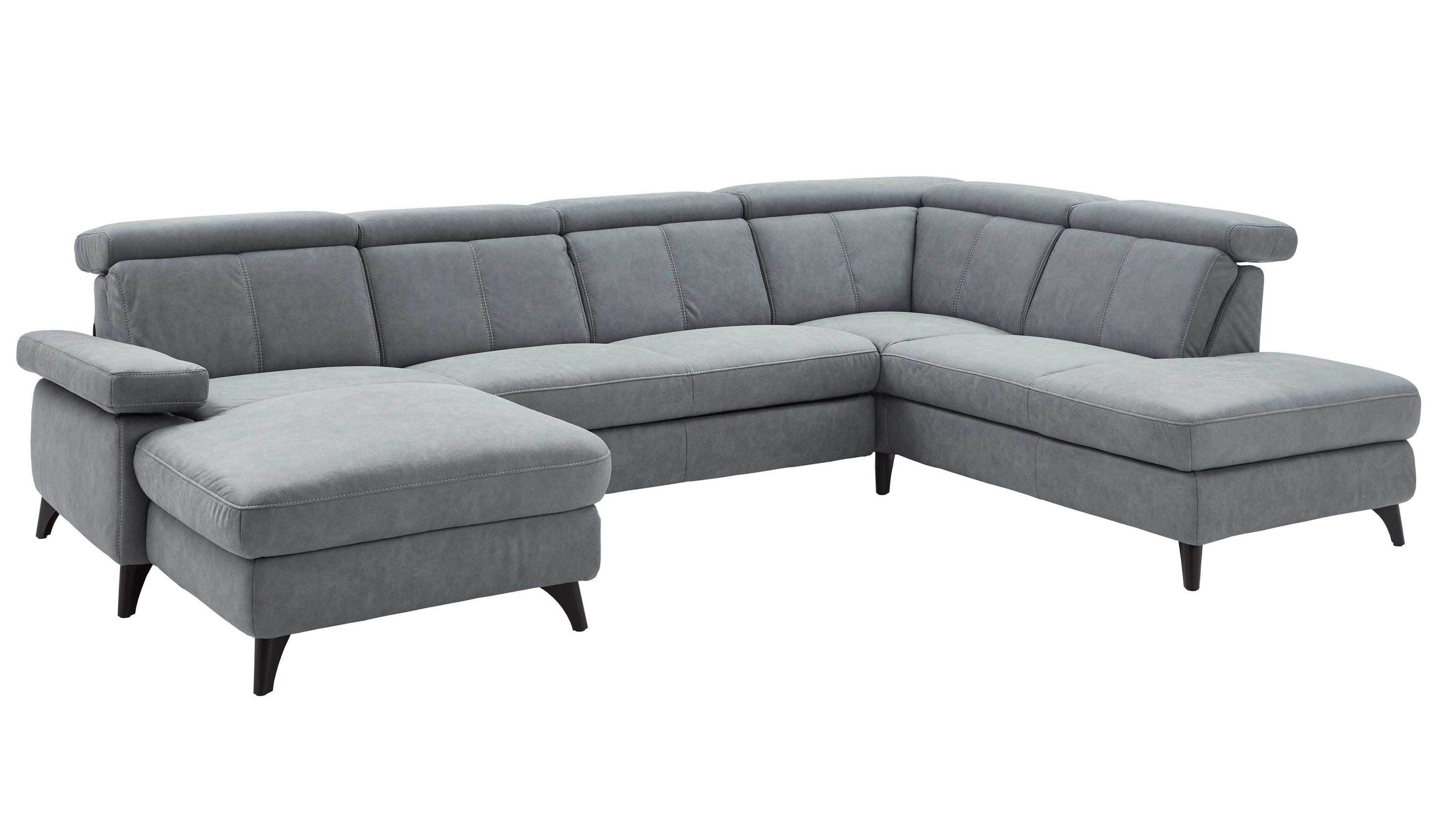 Wohnlandschaft mit graublauem Stoffbezug und schwarzen Füßen Wohnlandschaft mit graublauem Stoffbezug und schwarzen Füßen in L-Form mit verstellbaren Kopfstützen