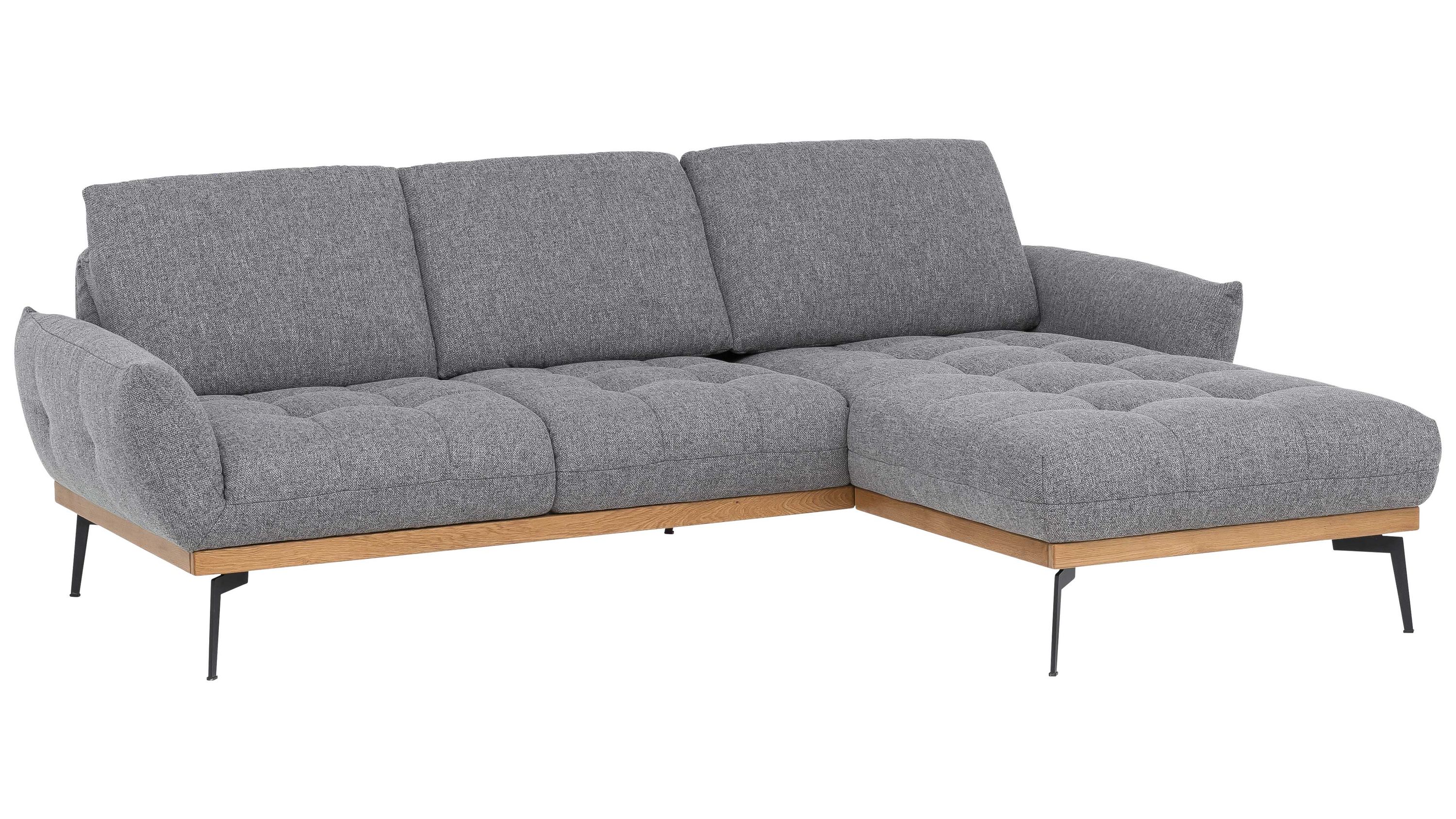 Graues Ecksofa mit Stoffbezug und Holzrahmen Ecksofa mit grauem Stoffbezug drei Rückenlehnen Holzrahmen und schwarzen Metallbeinen