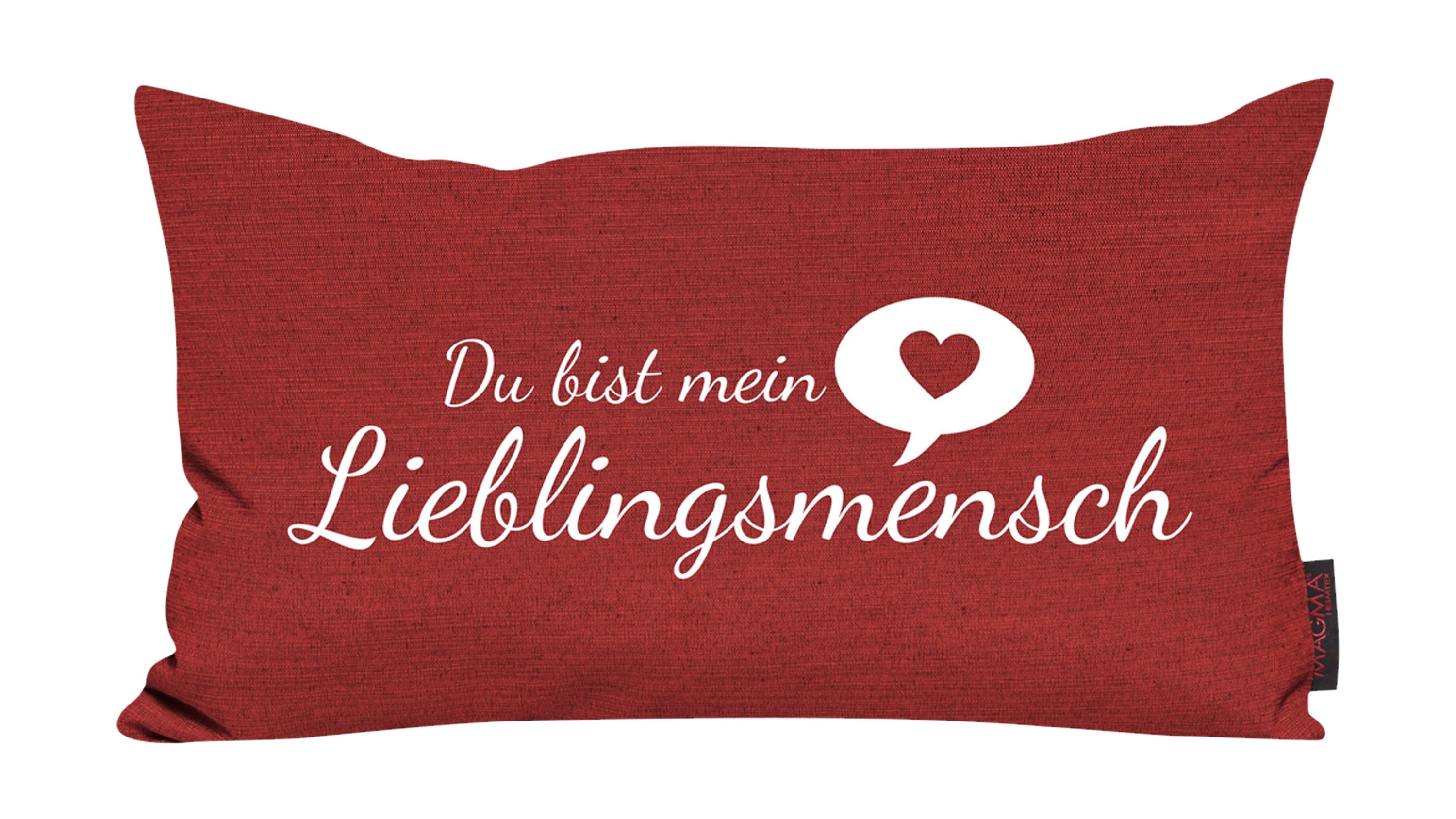 Rechteckiges Kissen mit rotem Bezug und weißem Schriftzug Du bist mein Lieblingsmensch