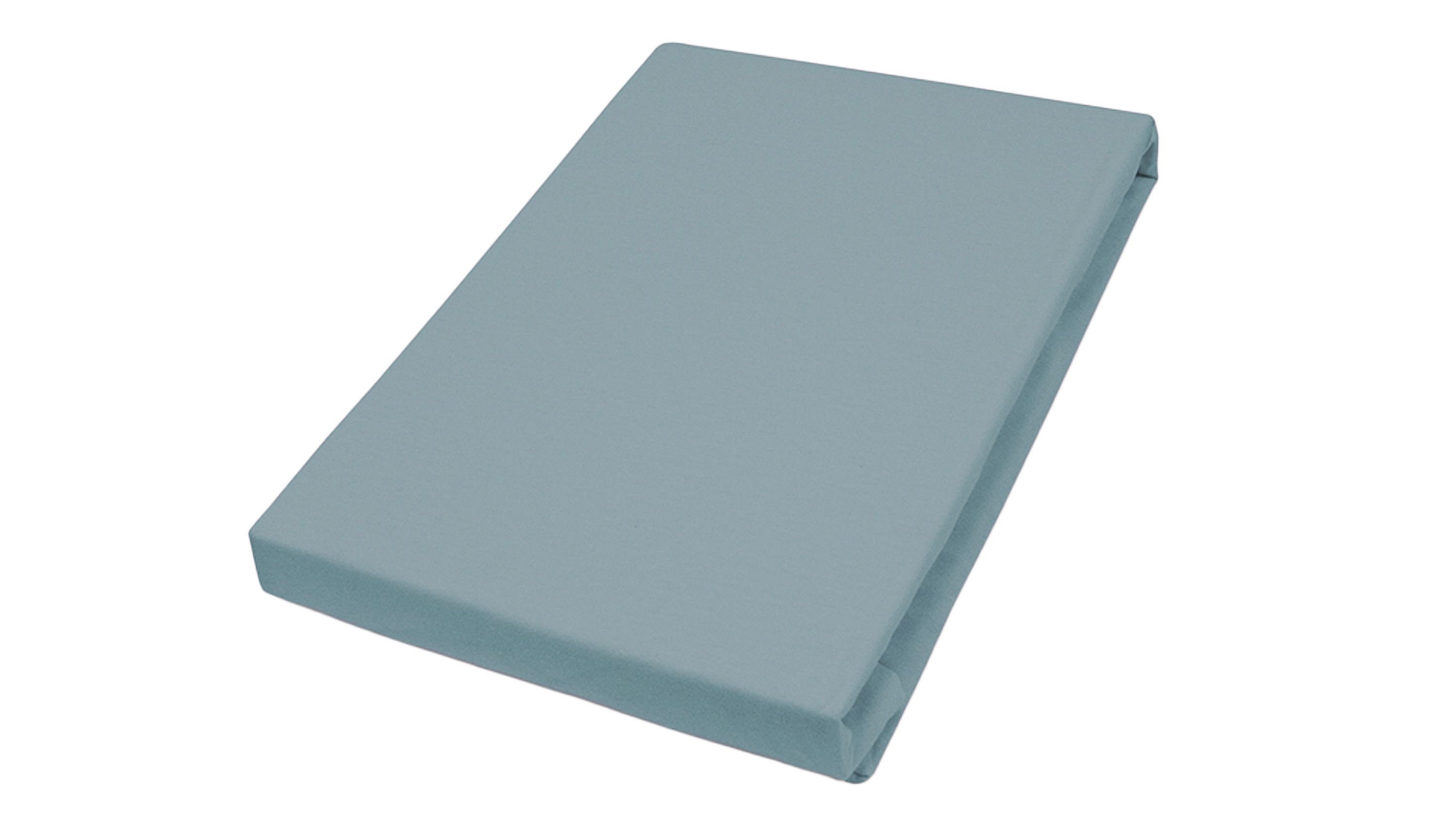 Aquamarinfarbenes Spannbettlaken aus Jerseystoff gefaltet