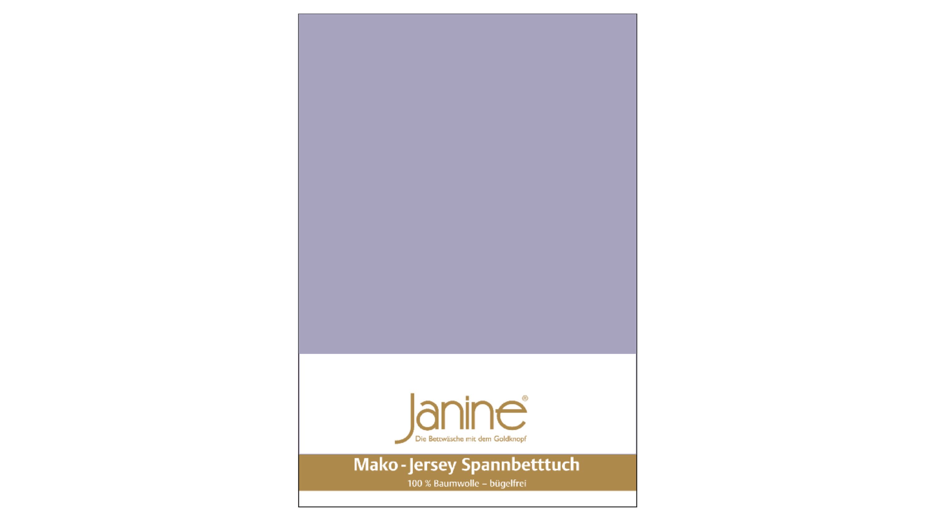 Spannbettlaken in einfarbigem lavendelfarbenem Stoff mit Verpackung und sichtbarem Markennamen