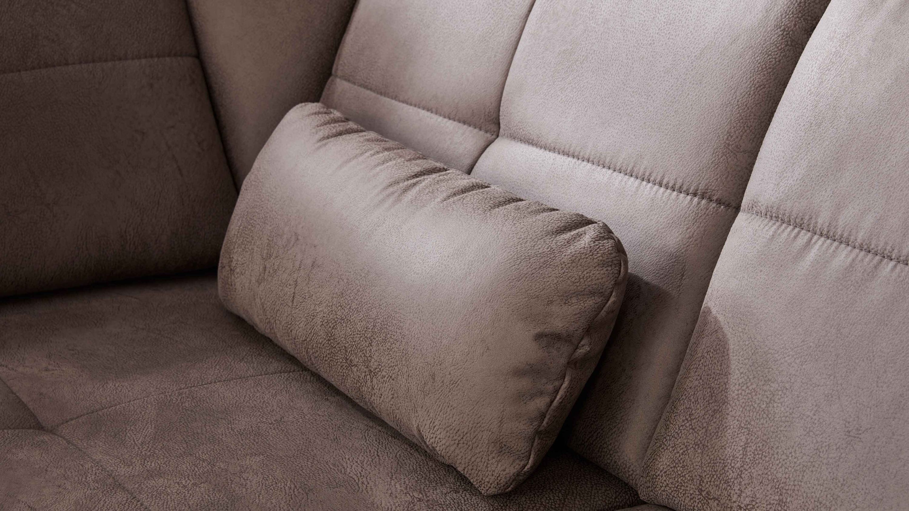 Rechteckiges Nierenkissen mit grauem Bezug auf einem grauen Sofa