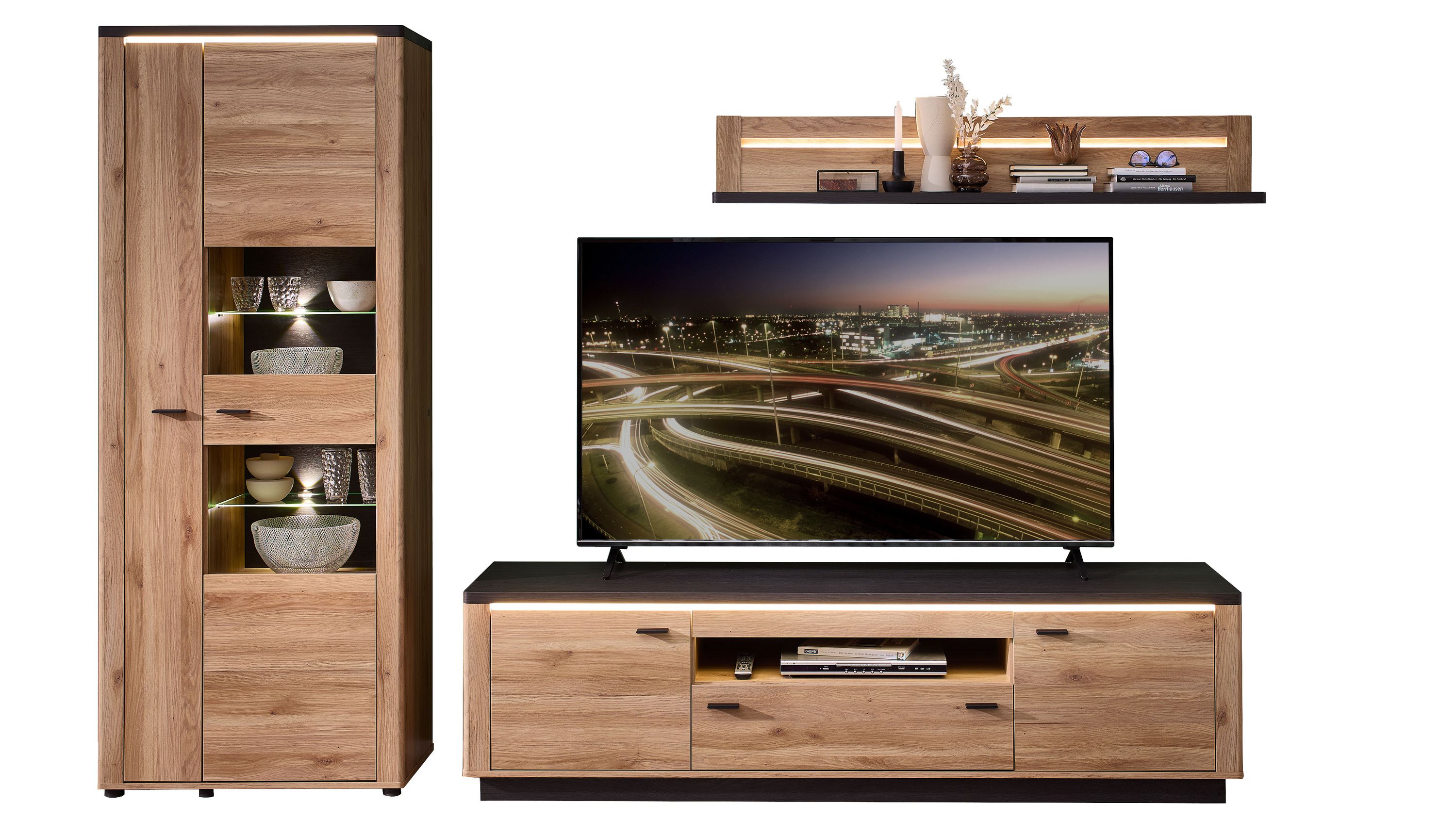 Dreiteilige Wohnwand mit Beleuchtung in Holzoptik und dunkler Oberfläche Dreiteilige Wohnwand mit Beleuchtung aus Holzoptik und dunkler Oberfläche bestehend aus Vitrine TV-Board und Wandregal
