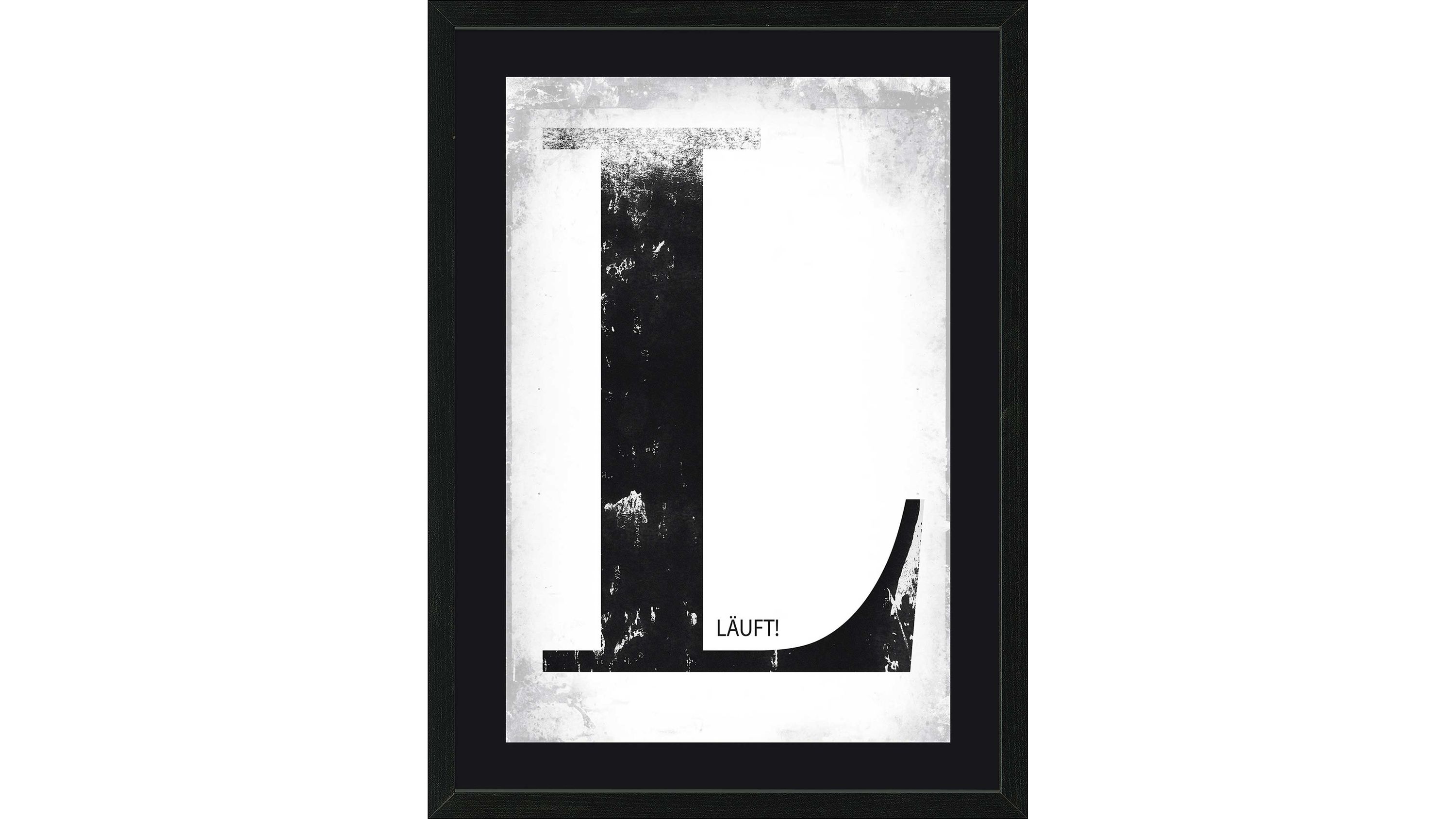 Schwarzer Kunstdruck mit großem Buchstaben L und kleinem Schriftzug läuft auf weißem Hintergrund in schwarzem Rahmen