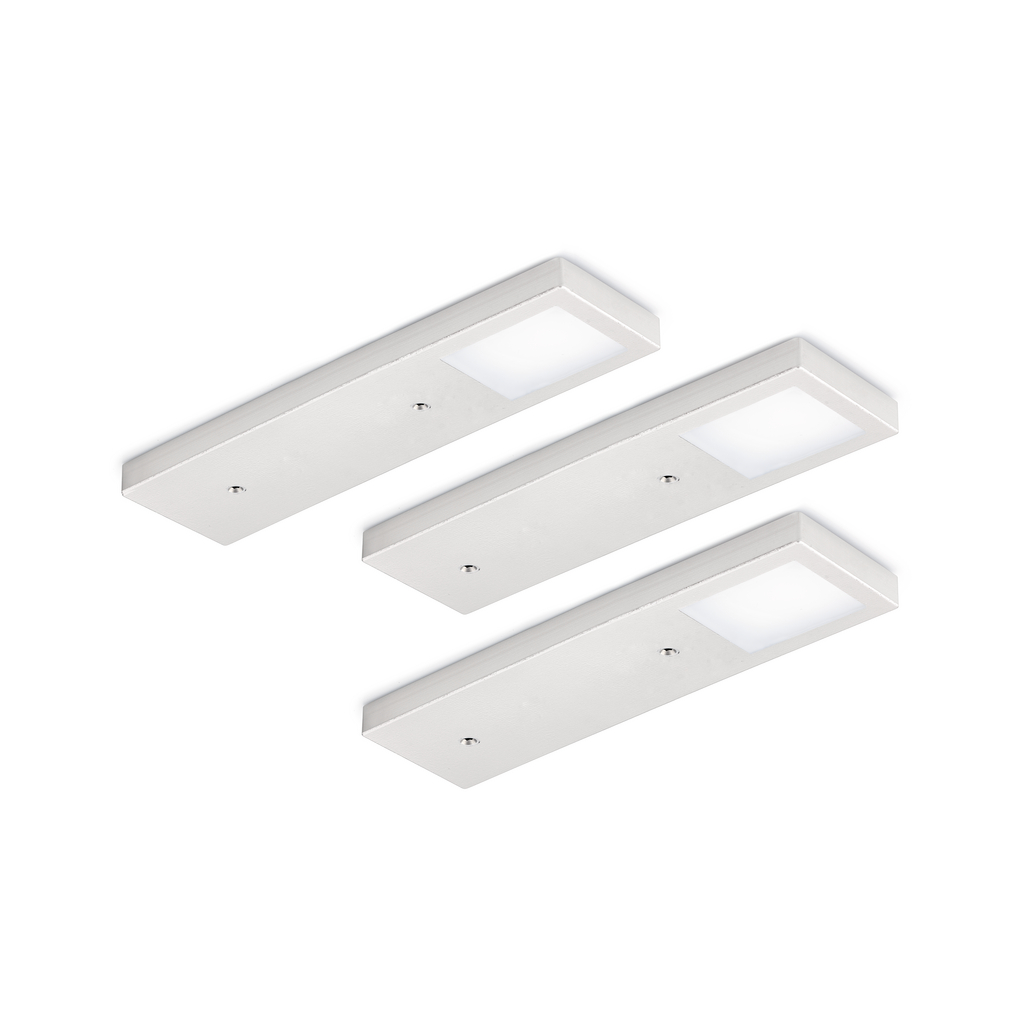 Abgebildet sind drei weiße LED-Unterbauleuchten mit rechteckigem Gehäuse
