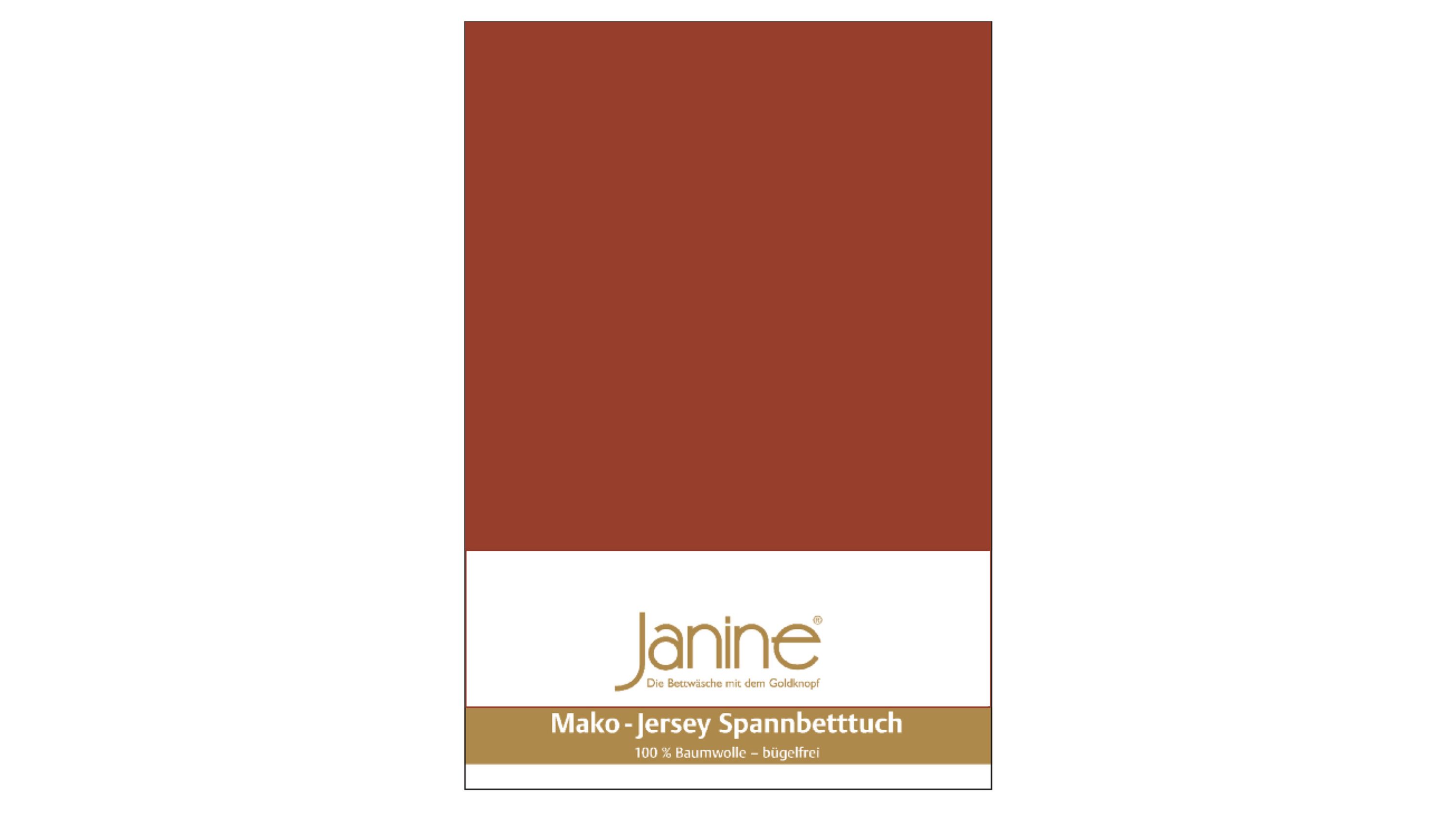 Rotes Spannbettlaken mit weißem und goldfarbenem Etikett mit Markenname Janine