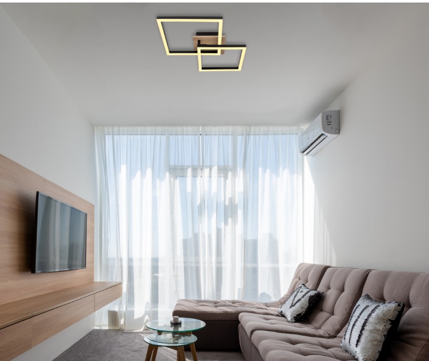 Deckenleuchte mit zwei rechteckigen Rahmen aus Metall und Kunststoff  von unten fotografiert  in modernem Wohnzimmer