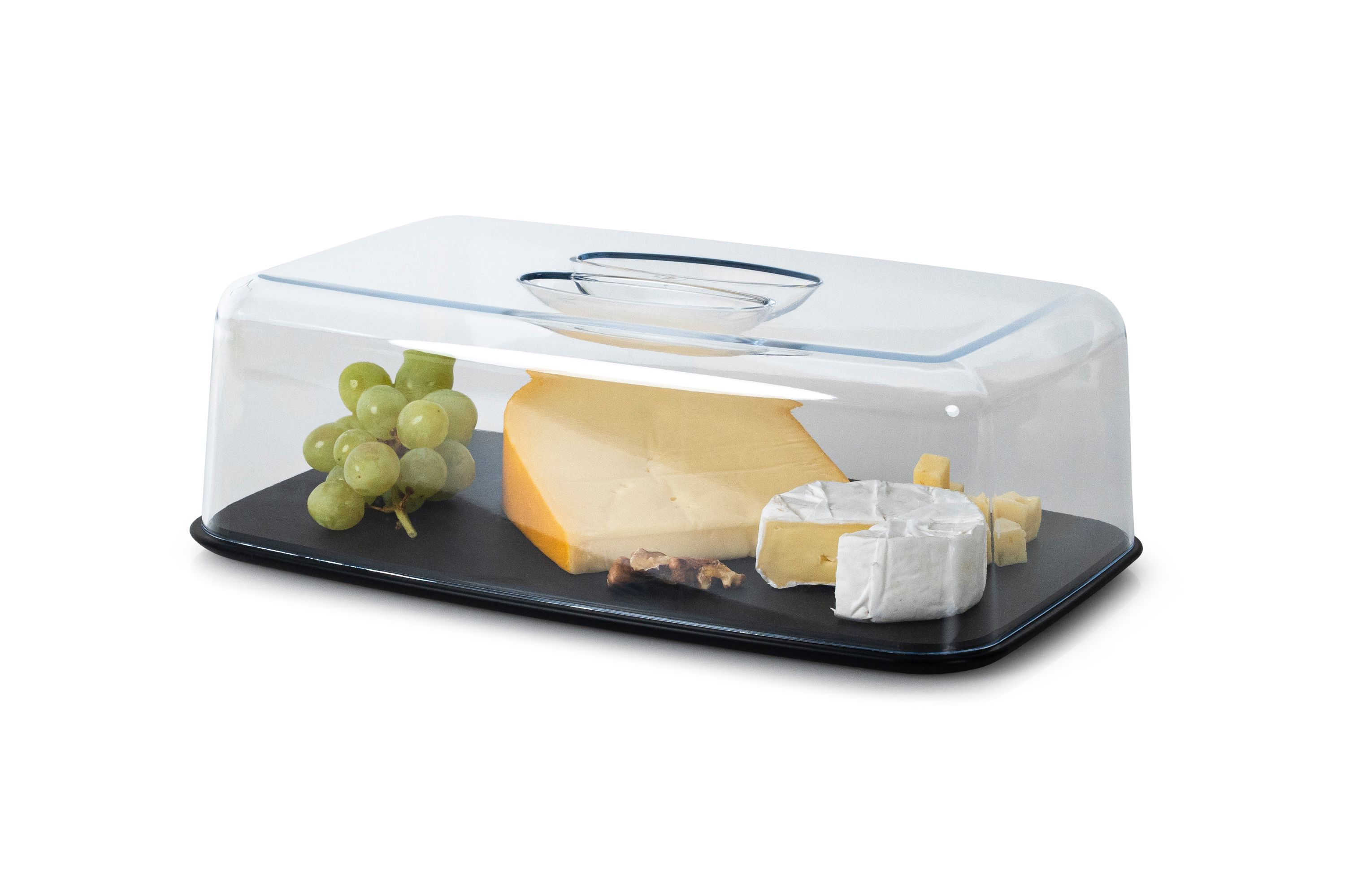 Rechteckige Käseglocke mit schwarzem Boden transparentem Deckel gefüllt mit Käse Trauben kleinem Behälter schräg vorn rechts