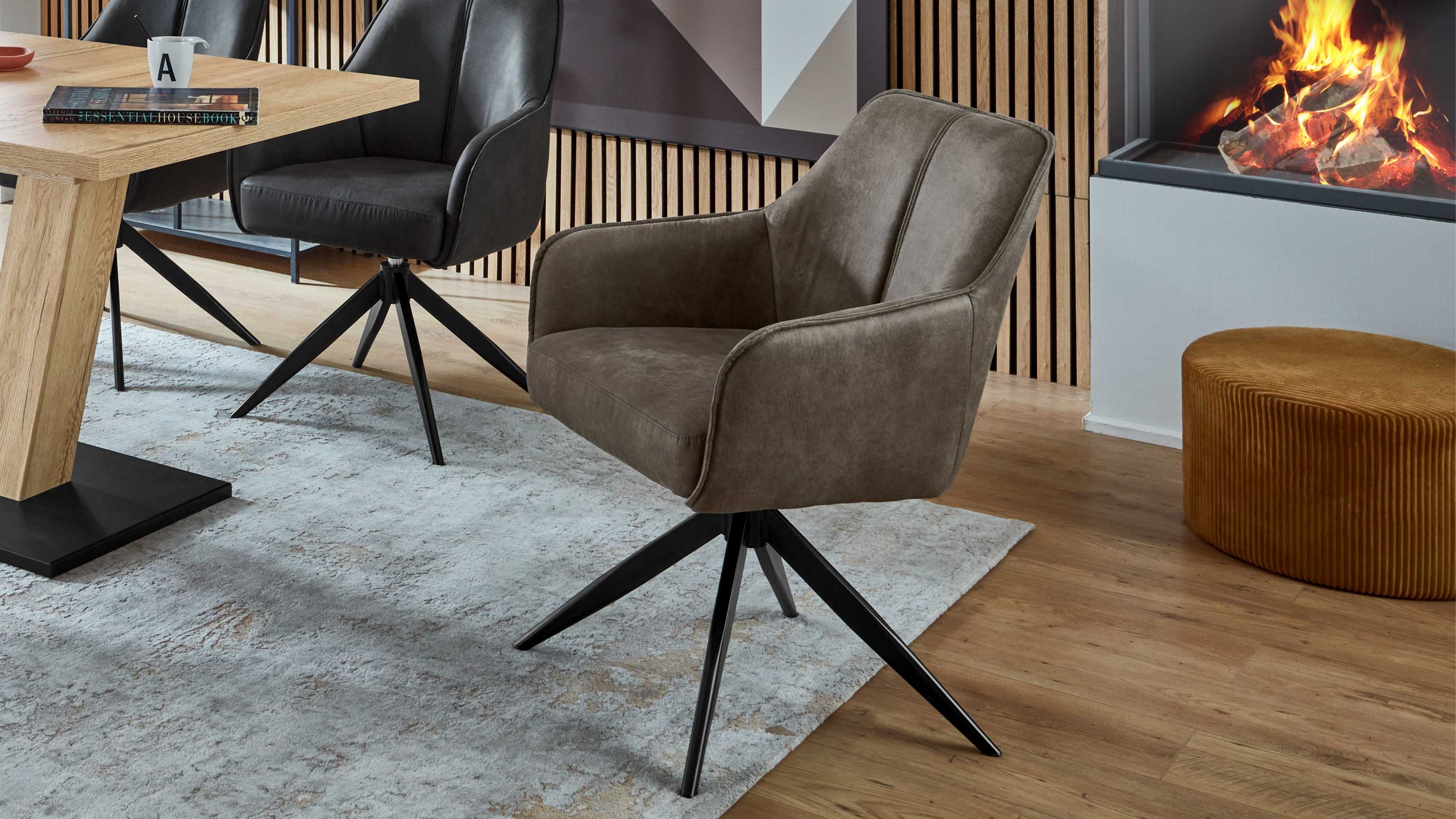 Armlehnstuhl mit Drehfunktion in steinfarbener Mikrofaser Armlehnstuhl mit Drehfunktion in steinfarbener Mikrofaser und schwarzem Metallgestell