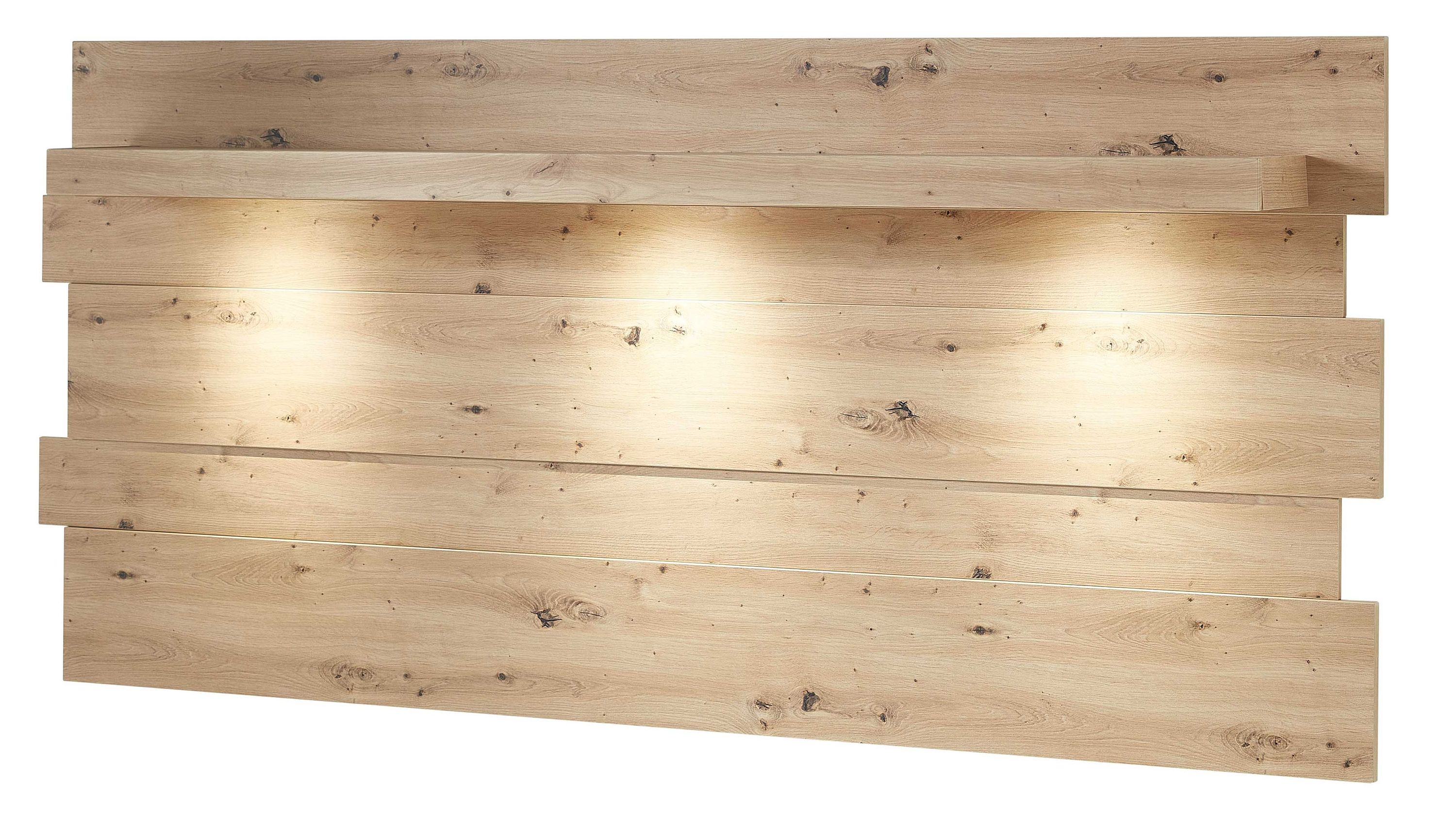 Rechteckiges Wandpaneel aus hellem Holz mit unregelmäßigen Kanten und integrierter Beleuchtung