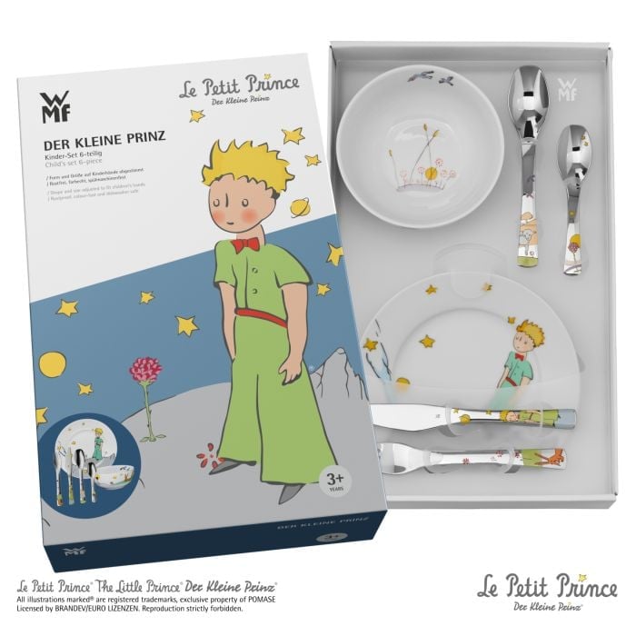 Frontale Ansicht eines 6-teiligen Kinderbestecks mit Teller & Schüssel in Verpackung mit Motiven von Der kleine Prinz