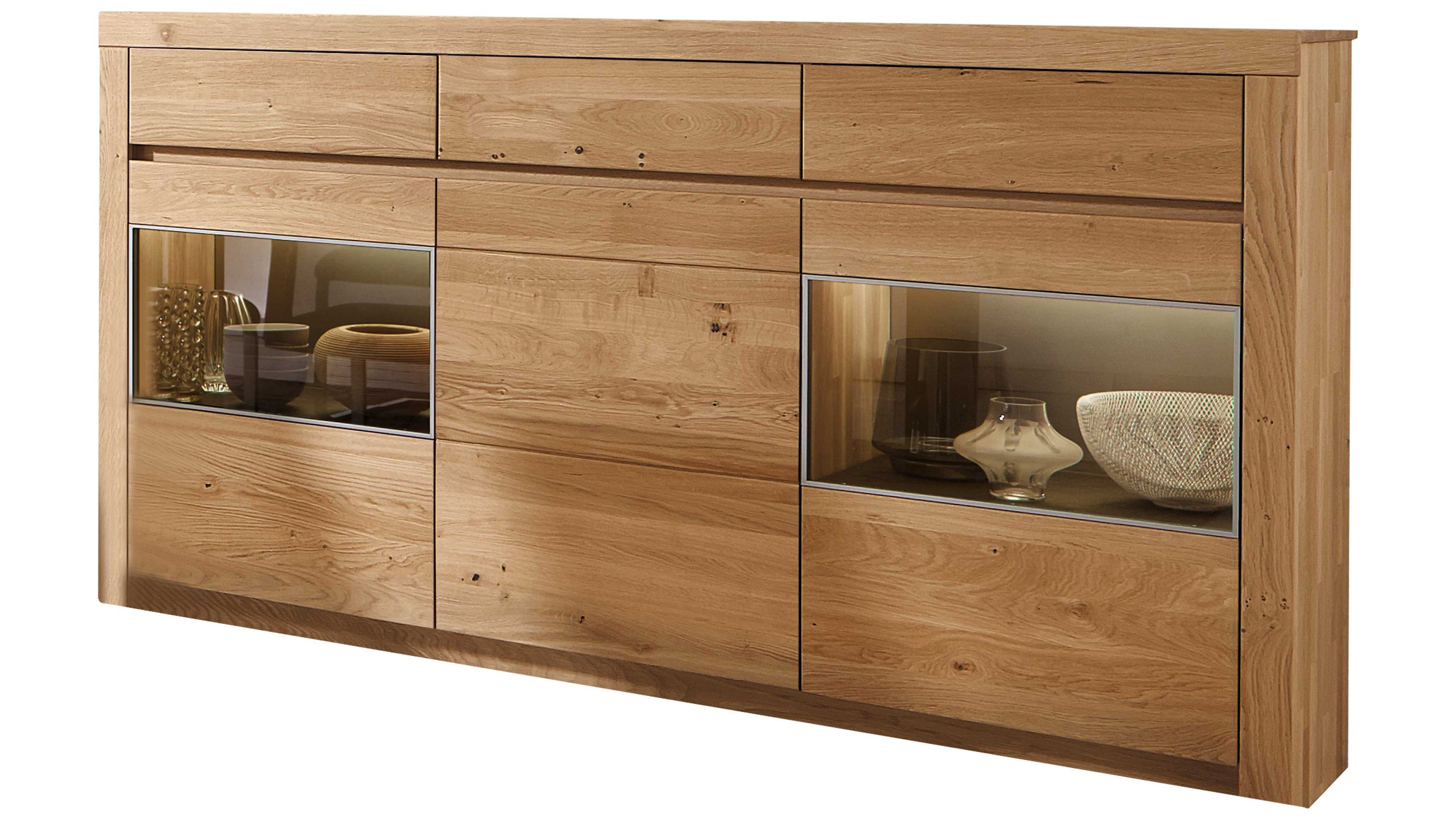 Sideboard aus Holz mit drei Türen zwei Glaseinsätzen und drei Schubladen in hellbrauner Farbe