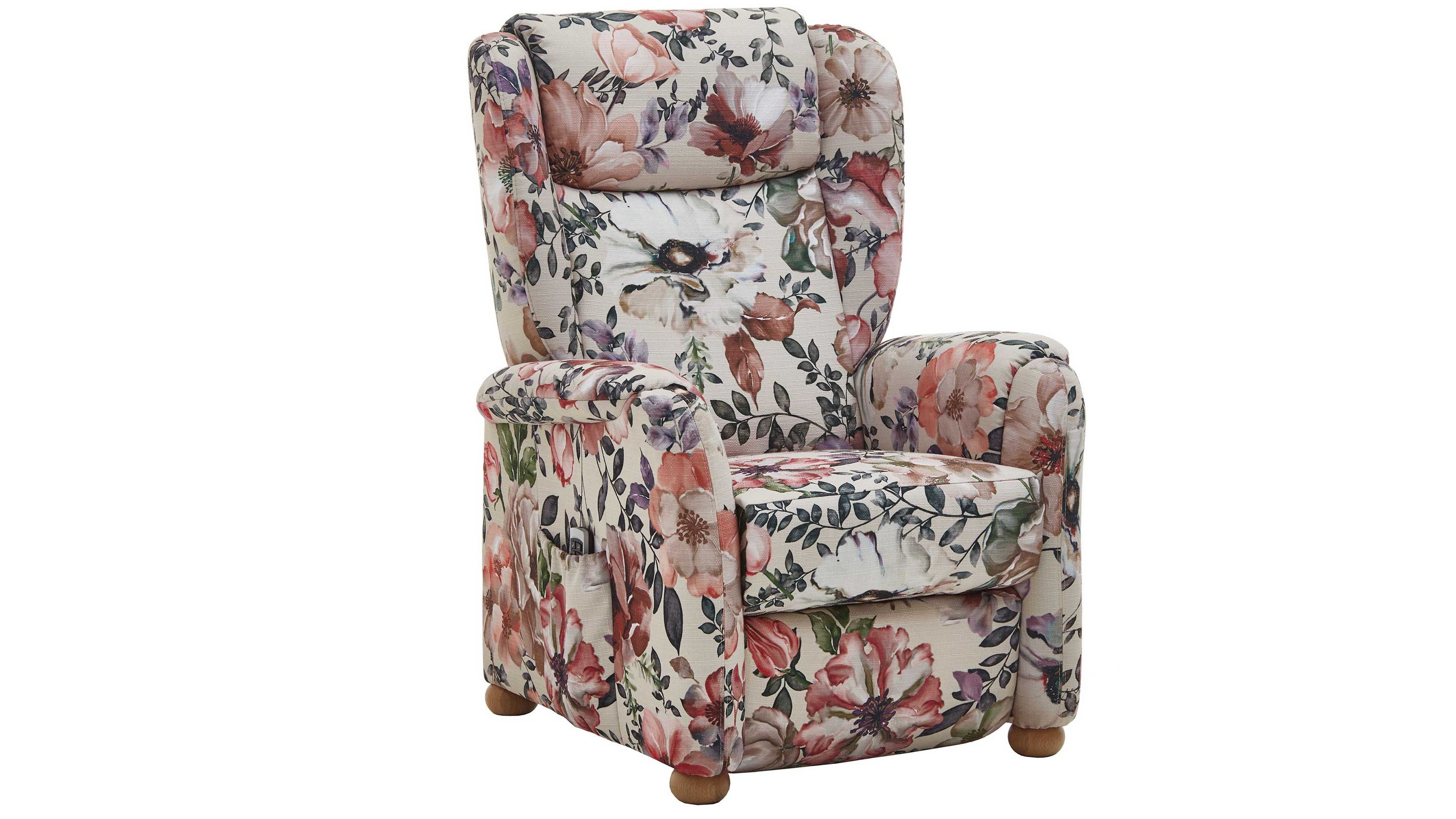 Ohrensessel mit floralem Stoffbezug in Beige mit bunten Blumen und runden hellen Holzfüßen