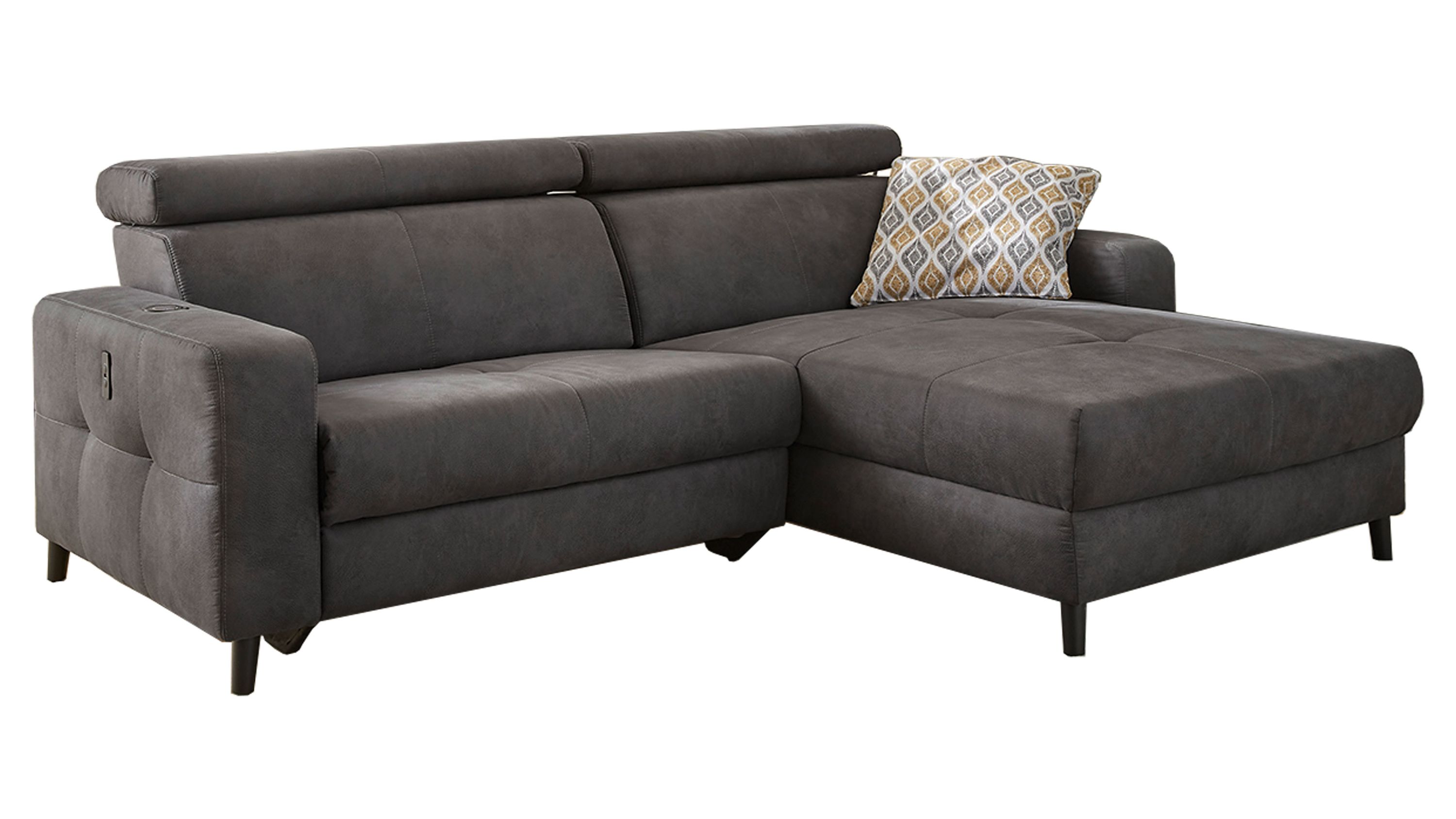 Dunkelgraues Ecksofa mit verstellbaren Kopfstützen und einem gemusterten Kissen