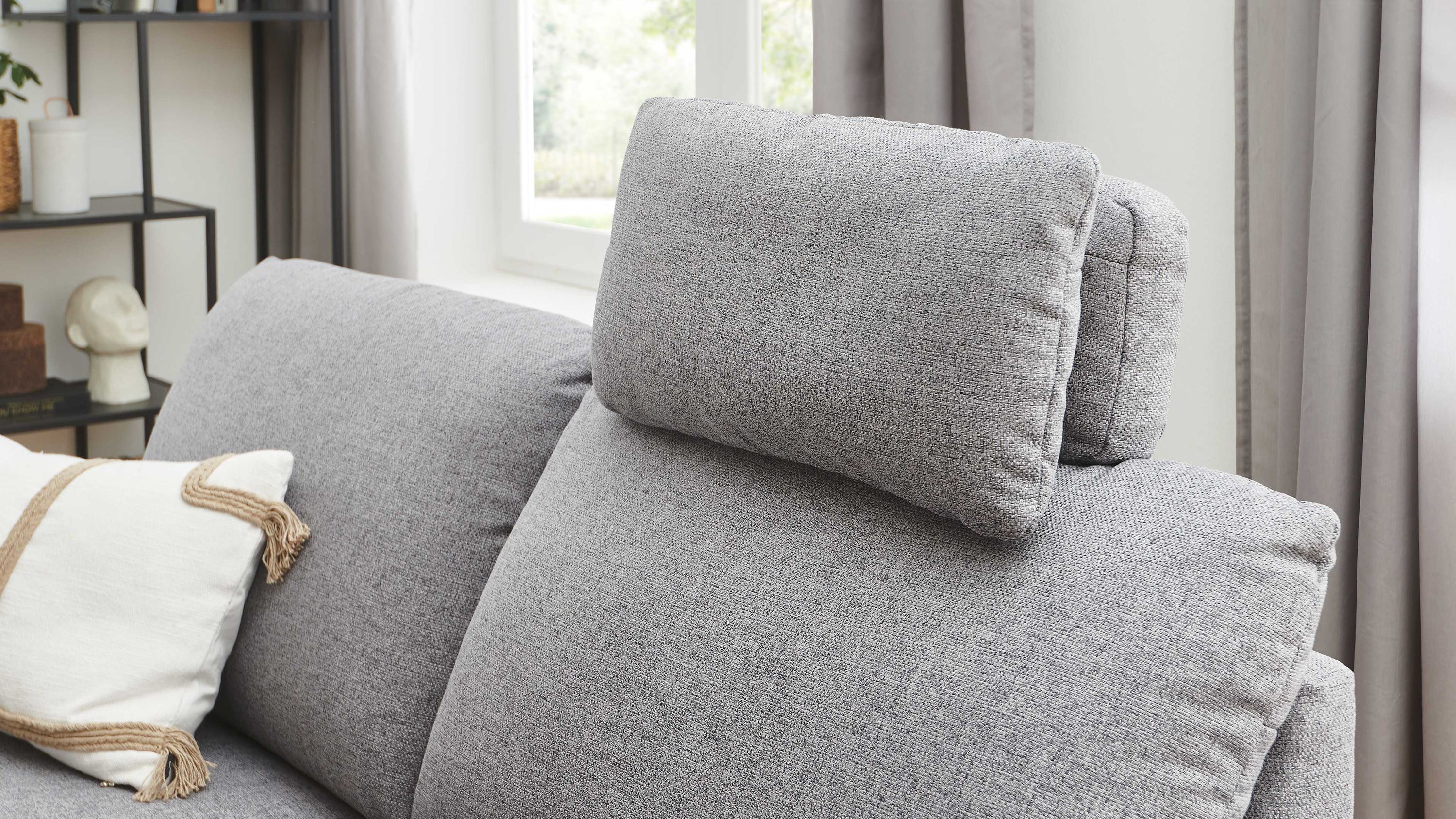 Multifunktions-Kopfstütze aus grauem Flachgewebe auf grauem Sofa