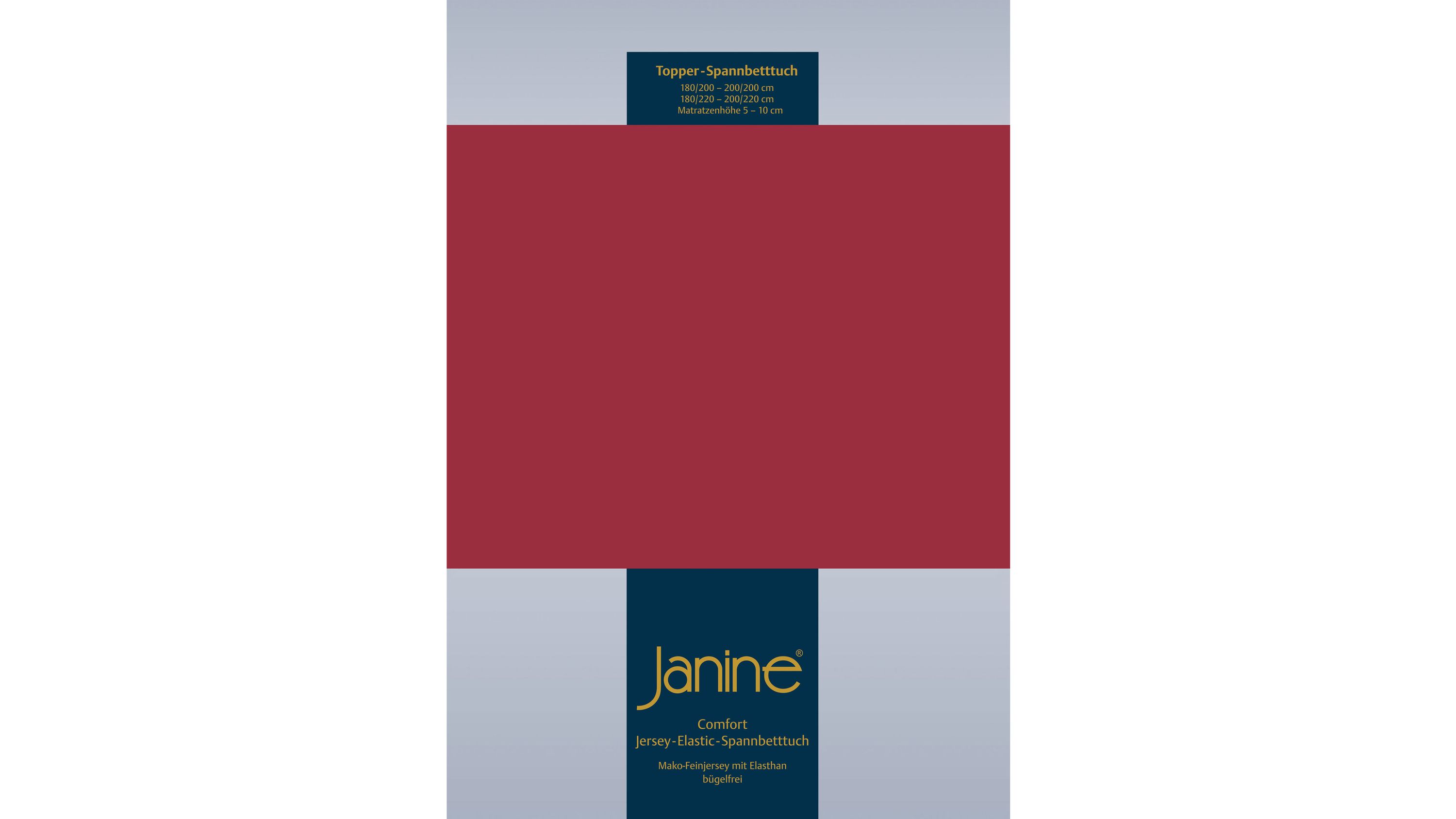 Rotes Spannbettlaken mit elastischem Jersey-Material und Markenetikett Janine