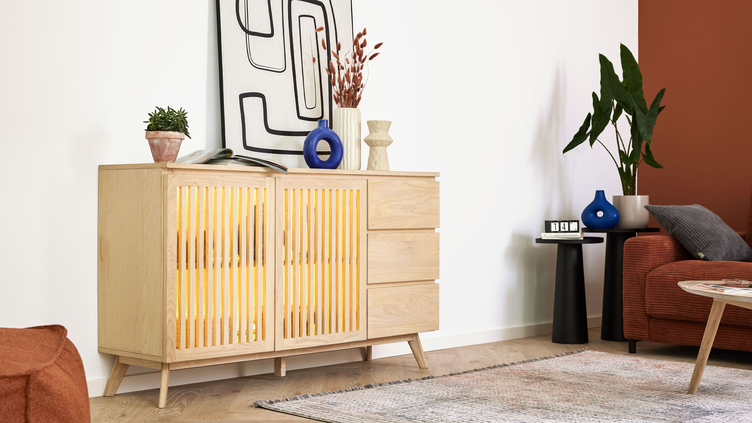 Sideboard mit zwei Türen und drei Schubladen in hell gewaschener Holzoptik mit integrierter Beleuchtung