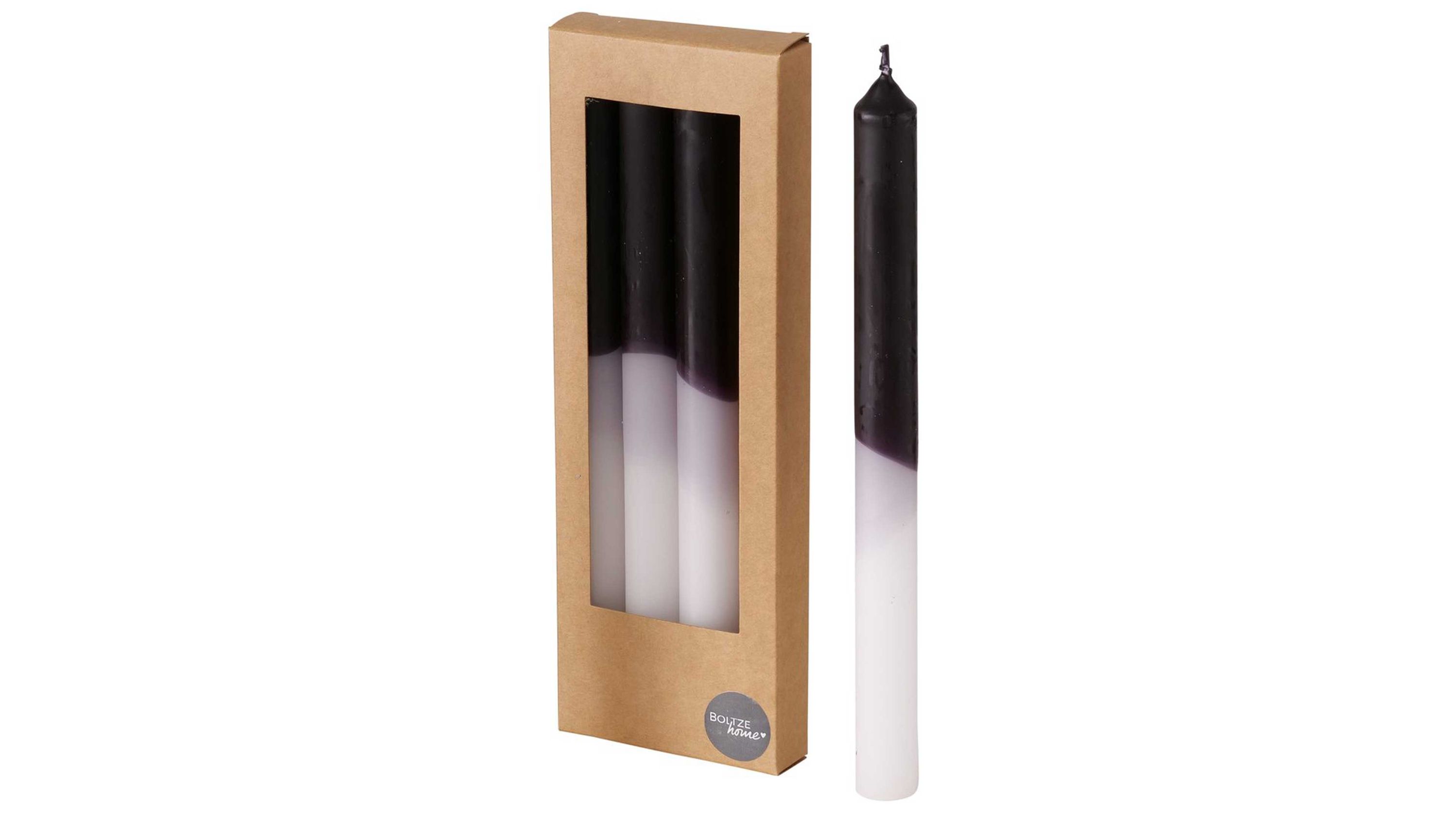 Set aus drei Stabkerzen mit Farbverlauf von schwarz über grau zu weiß in brauner Verpackung