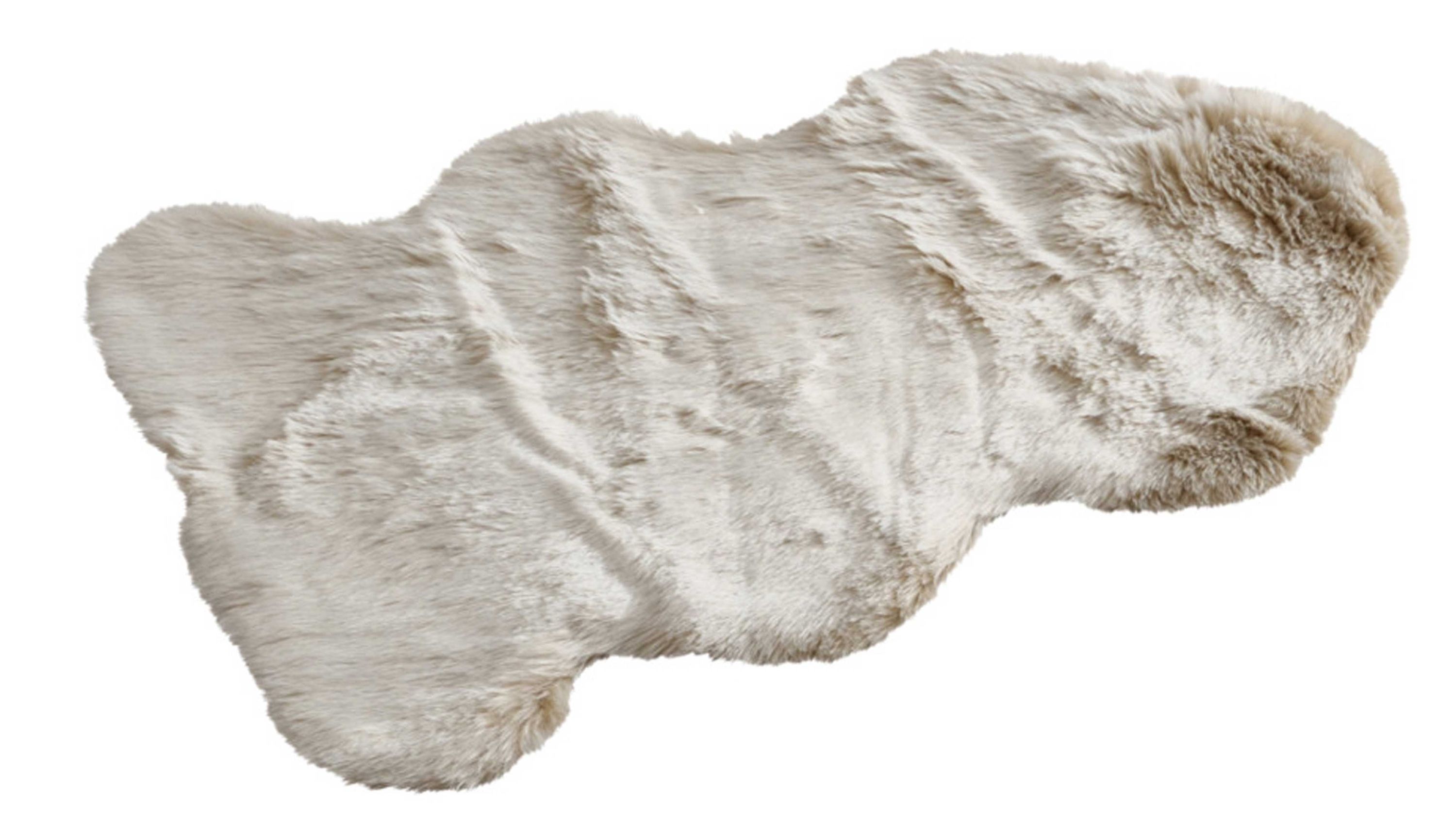 Beige Dekofell mit unregelmäßiger Form und weicher Oberfläche