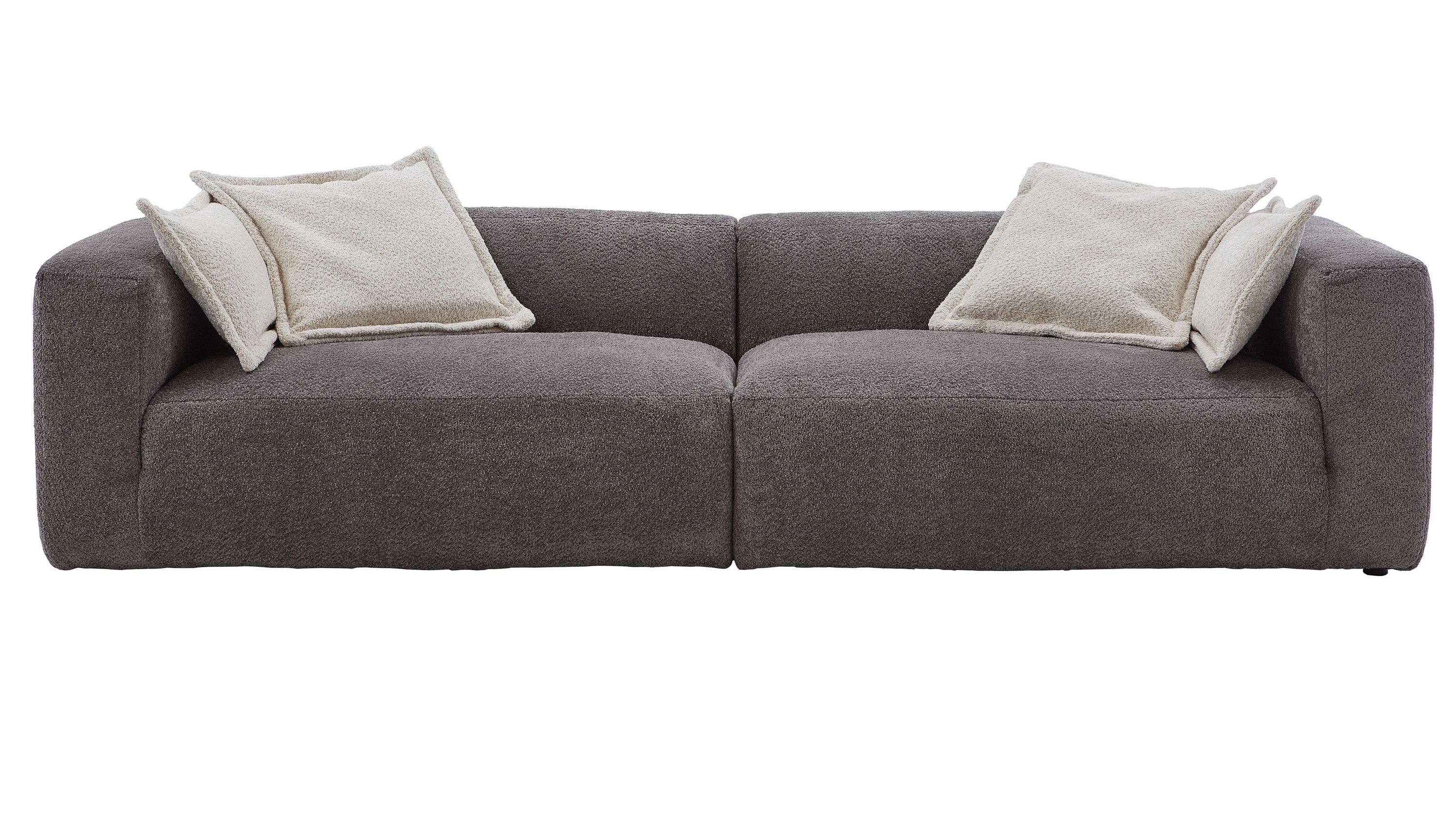 Großes Lounge-Sofa mit zwei Sitzflächen und anthrazitfarbenem Bezug mit vier hellen Kissen
