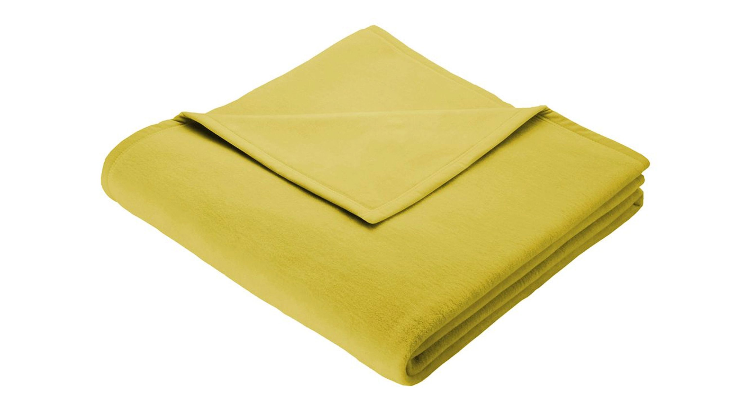 Gefaltete Wohndecke in hellgrüner Farbe aus Mischgewebe