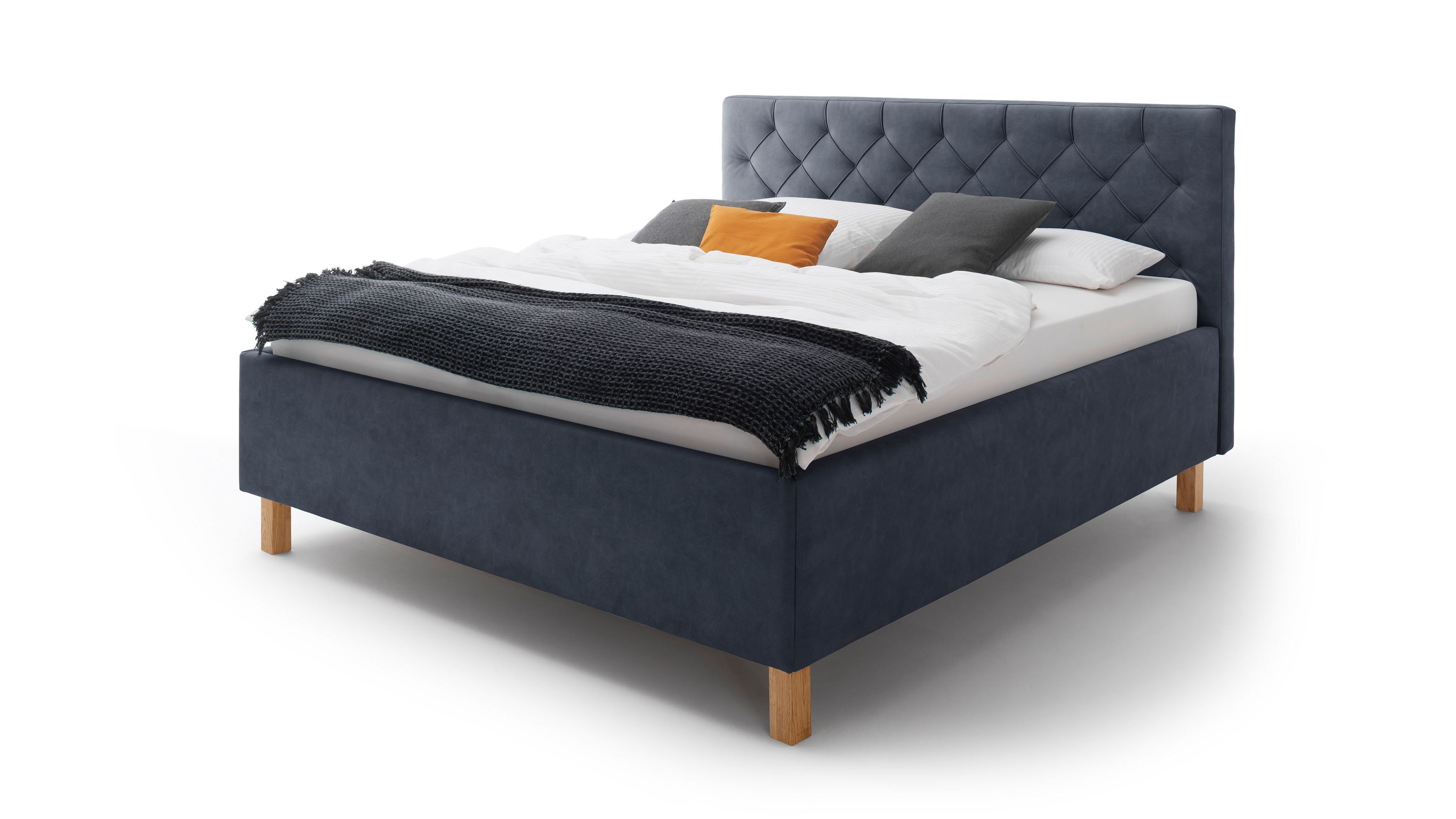Polsterbett mit taubenblauem Bezug und Holzfüßen Polsterbett mit taubenblauem Bezug eichefarbenen Holzfüßen und gestepptem Kopfteil mit Bettkasten