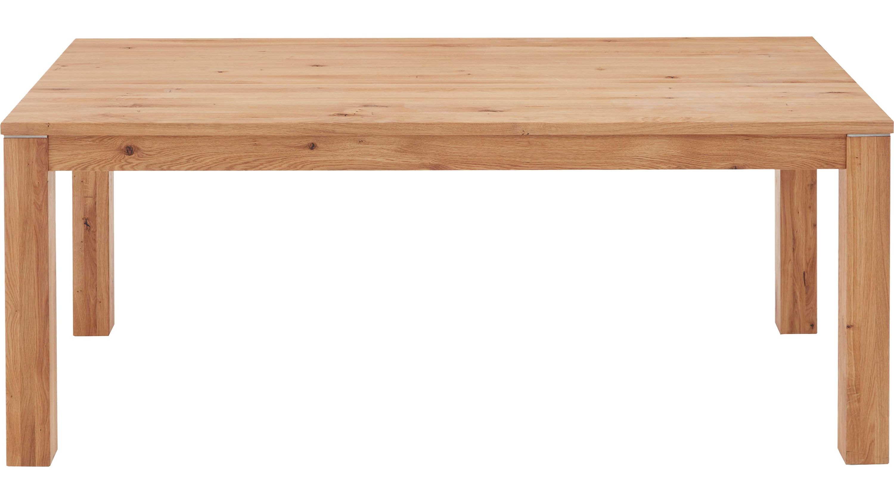 Rechteckiger Esstisch aus hellem Holz mit vier dicken Beinen