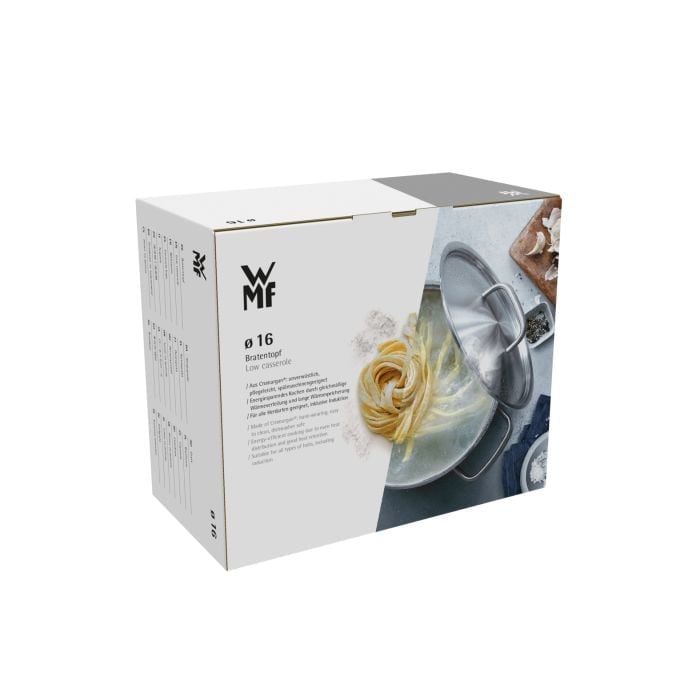 Leicht von links aufgenommene Verpackung mit WMF-Logo zeigt Bratentopf mit Glasdeckel und Speisen als Abbildung auf der Box
