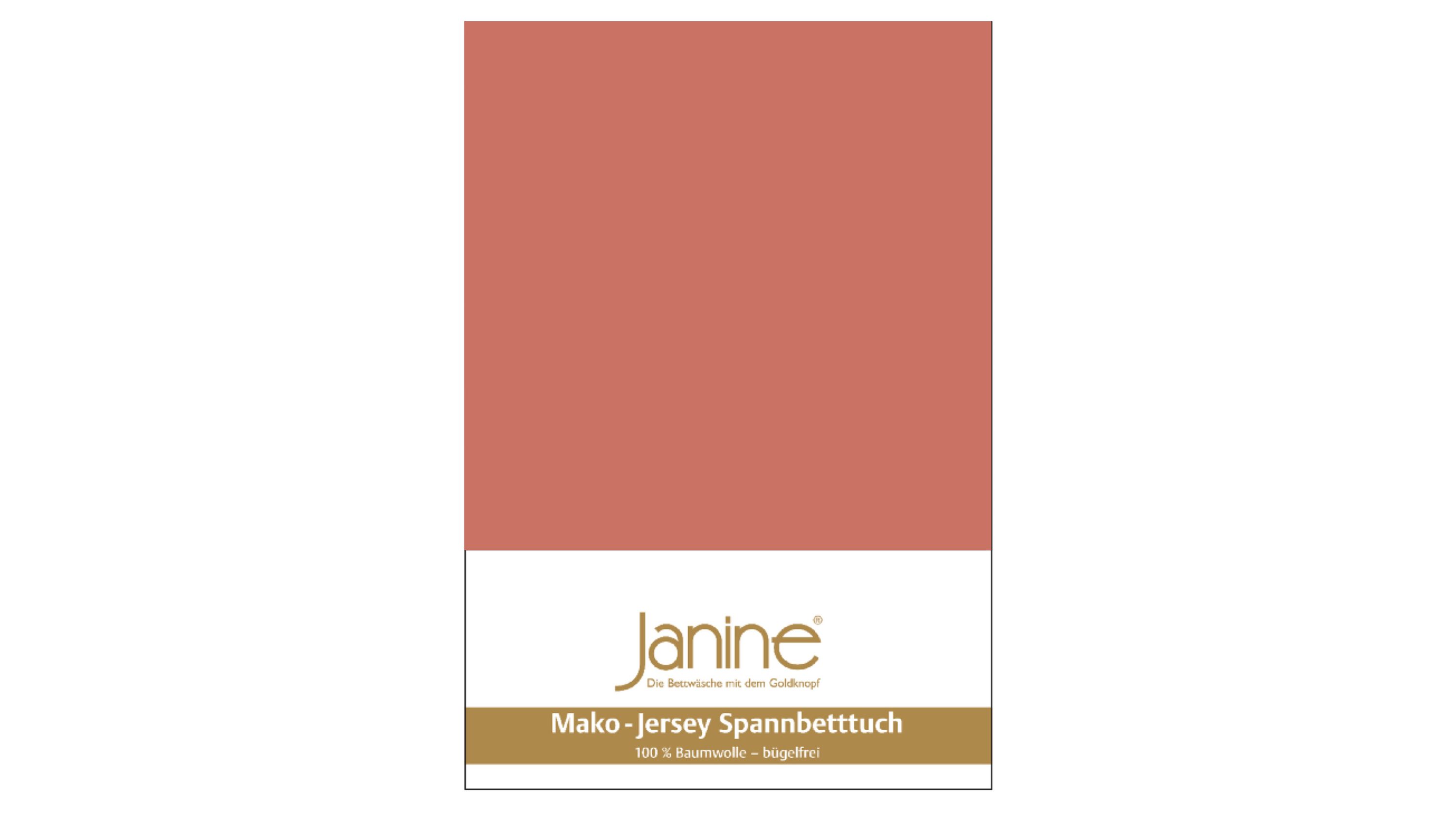 Rotes Spannbettlaken aus Jersey-Stoff mit Verpackung und Markenaufdruck