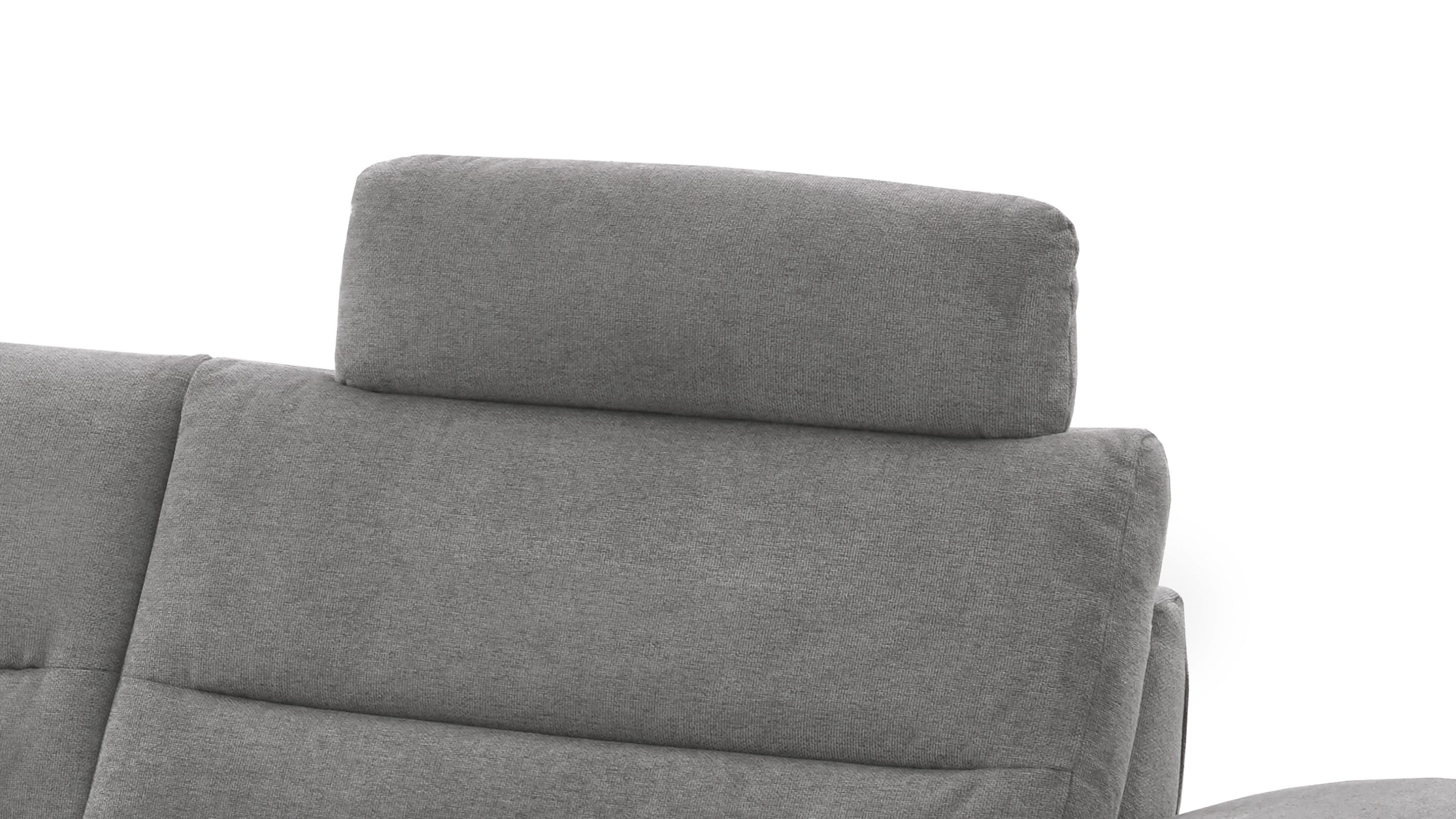 Graue Kopfstütze aus Flachgewebe auf grauem Sofarücken