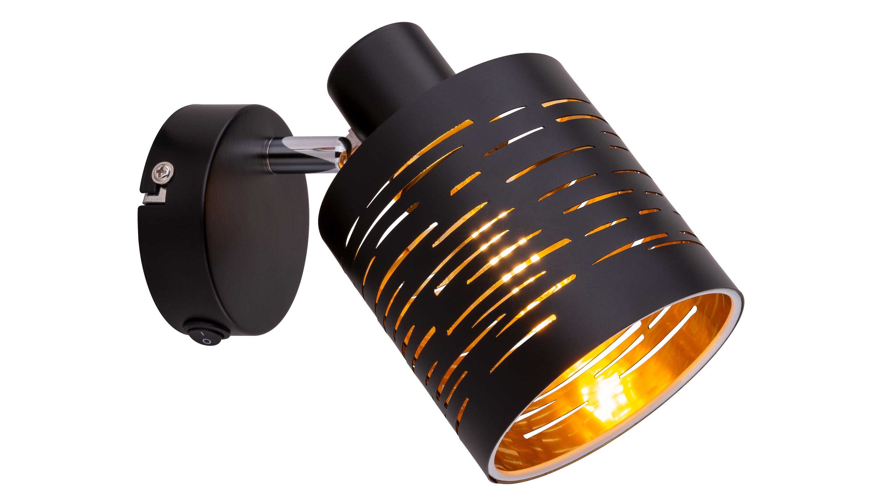 Schwarzer Wandspot mit zylindrischem Schirm und goldfarbener Innenseite mit schmalen Aussparungen