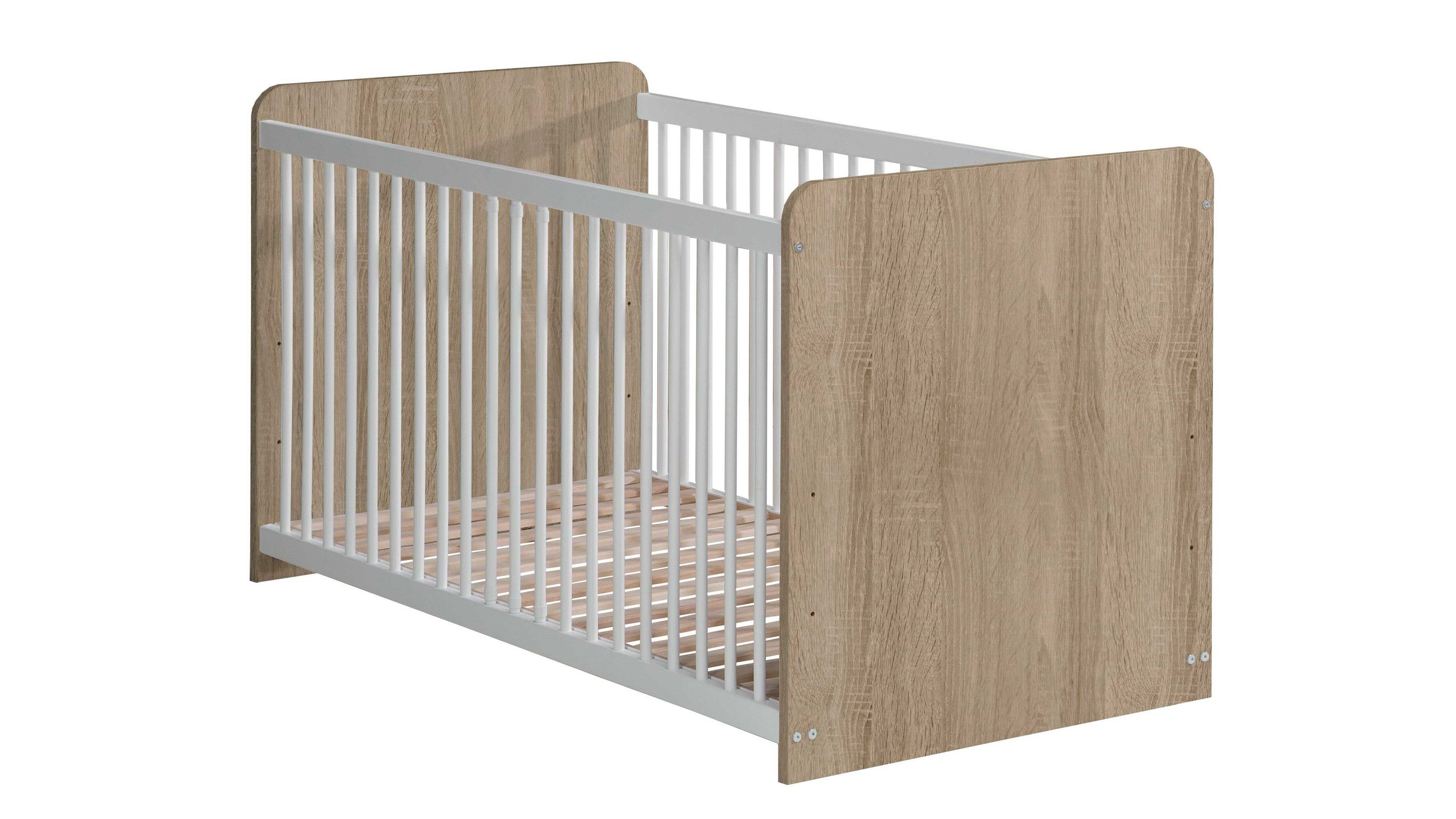 Babybettgestell mit eichefarbenen Seitenteilen und weißen Gitterstäben