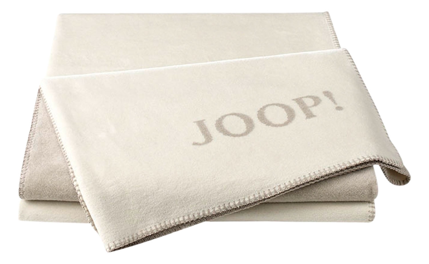 Zwei beige gefaltete Handtücher, das obere mit großem „JOOP!“-Schriftzug, von oben fotografiert