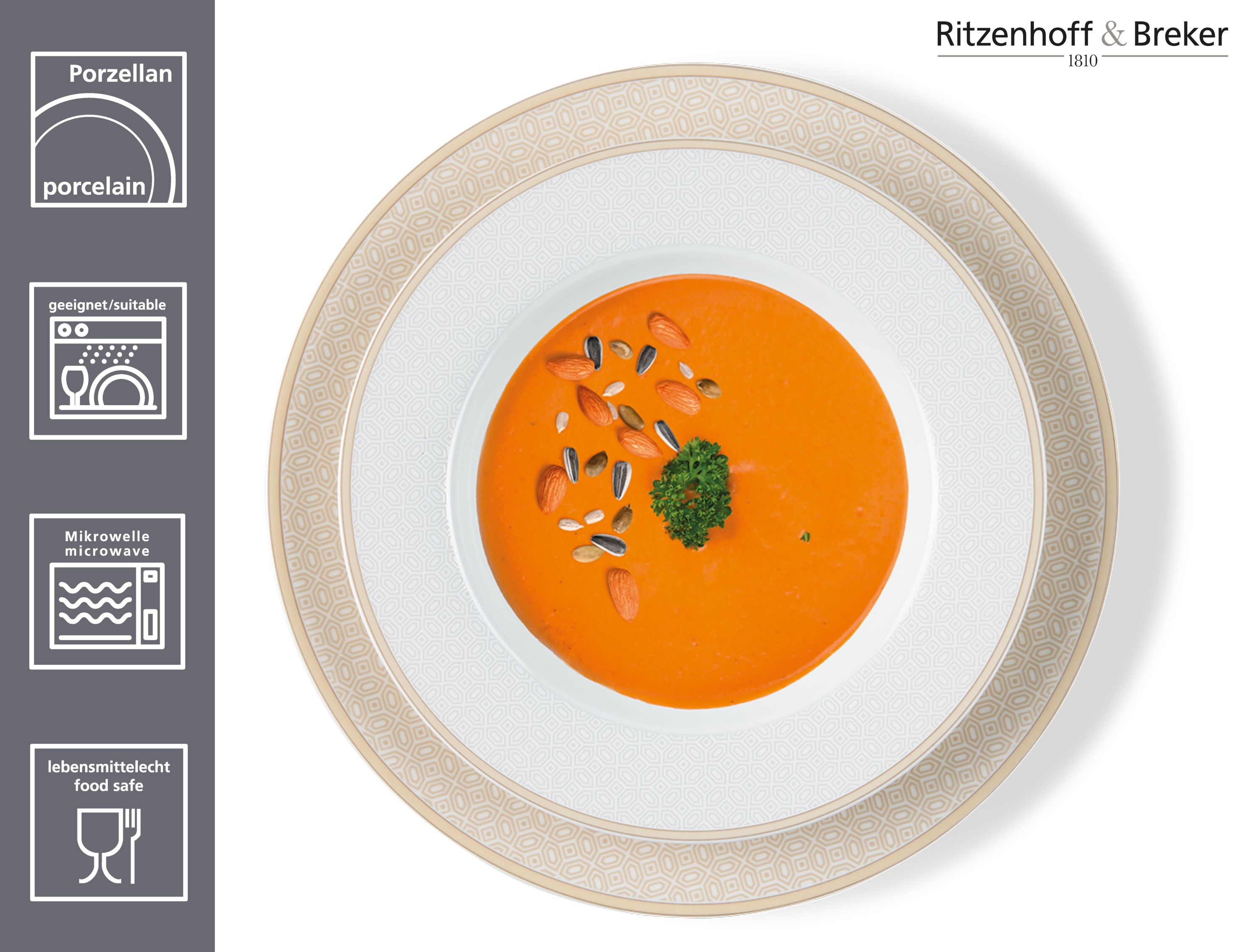 Rundes Porzellan-Teller-Set mit geometrischem Muster in Beige und Weiß gefüllt mit orangener Suppe und Nüssen